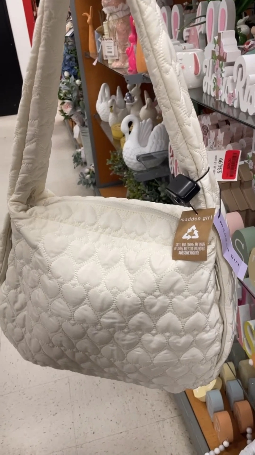 Trendy large puffy heart bag perfect as a travel carry on. I got this one at TJ Maxx but found it online in black and ivory! 

#LTKFindsUnder50