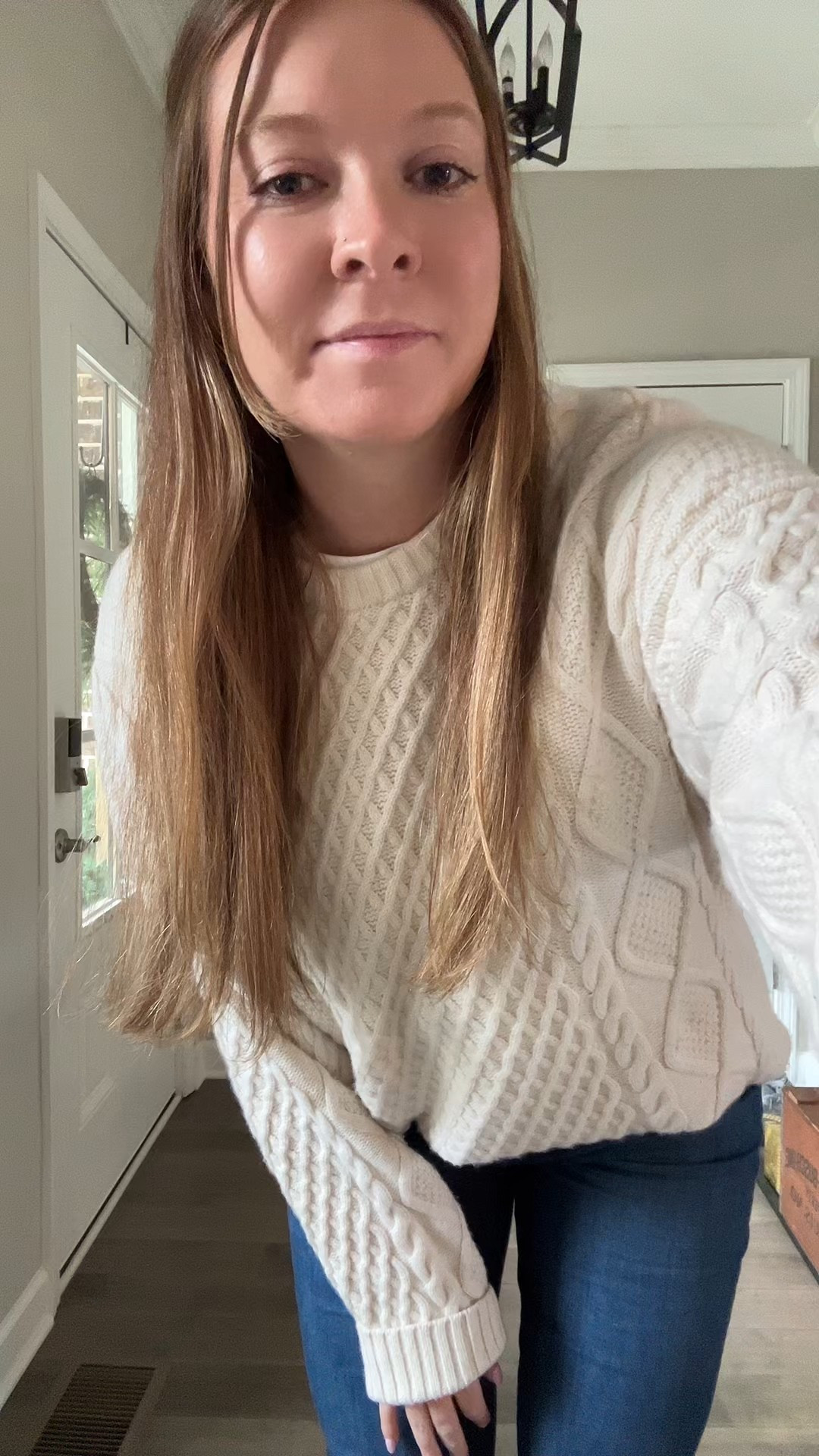 Ivory cable knit sweater / tts wearing a medium 
White tee / tts wearing a medium 
Flared jeans / tts 
Suede booties 

#LTKSaleAlert #LTKFindsUnder100 #LTKootd