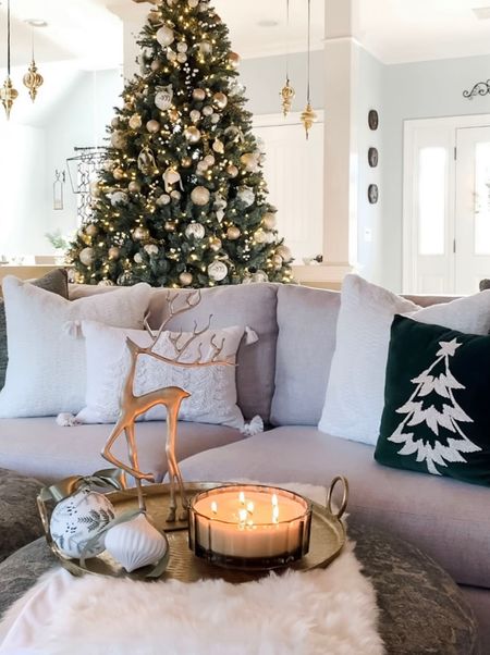 Holiday, Christmas living room style. Best selling brass reindeer, Christmas ornaments on sale, cozy and comfy white faux fur throw pillows and blankets, lighted Christmas trees. Pottery Barn, Macy’s, 

#LTKhome #LTKsalealert #LTKSeasonal