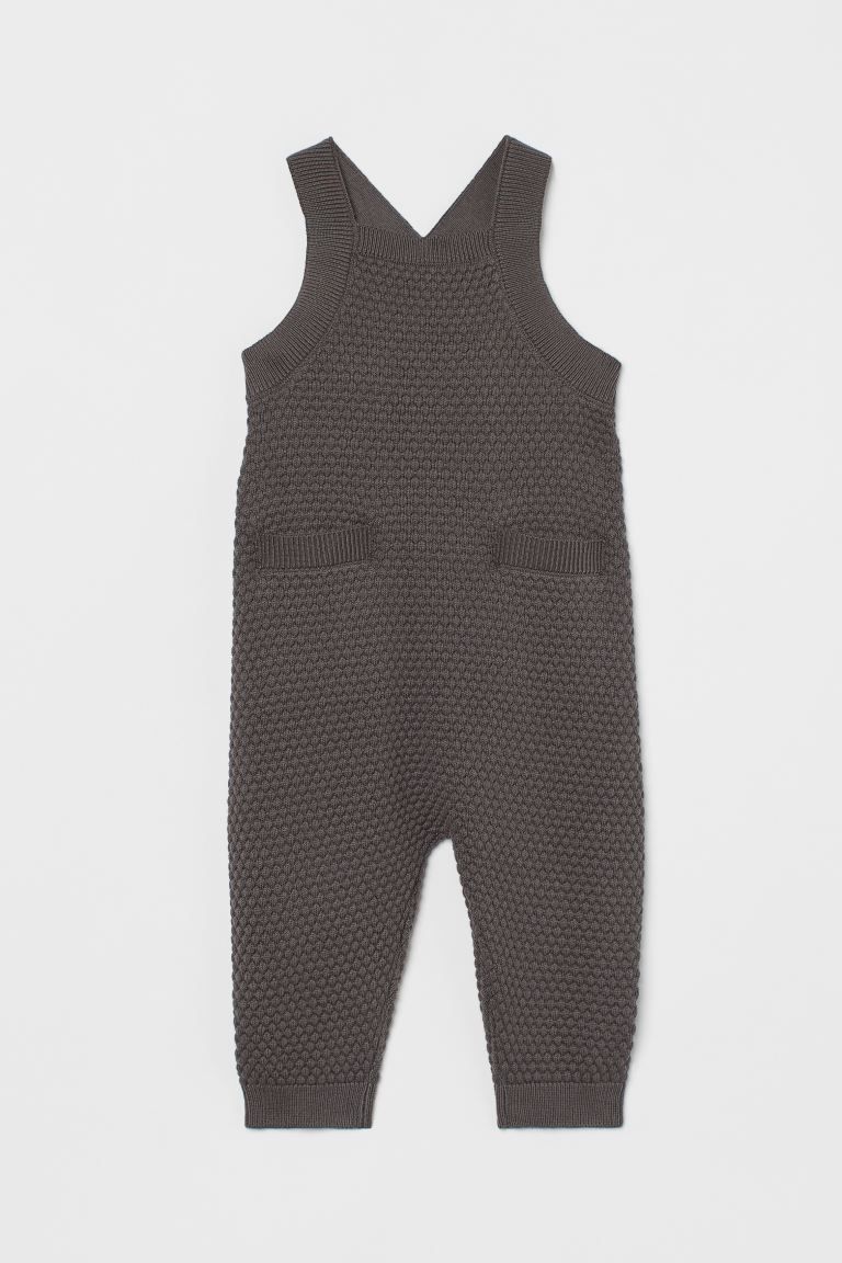 Baby Exclusive. Textured-knit overalls in soft, organic cotton with front pockets. Straps crossed... | H&M (US)