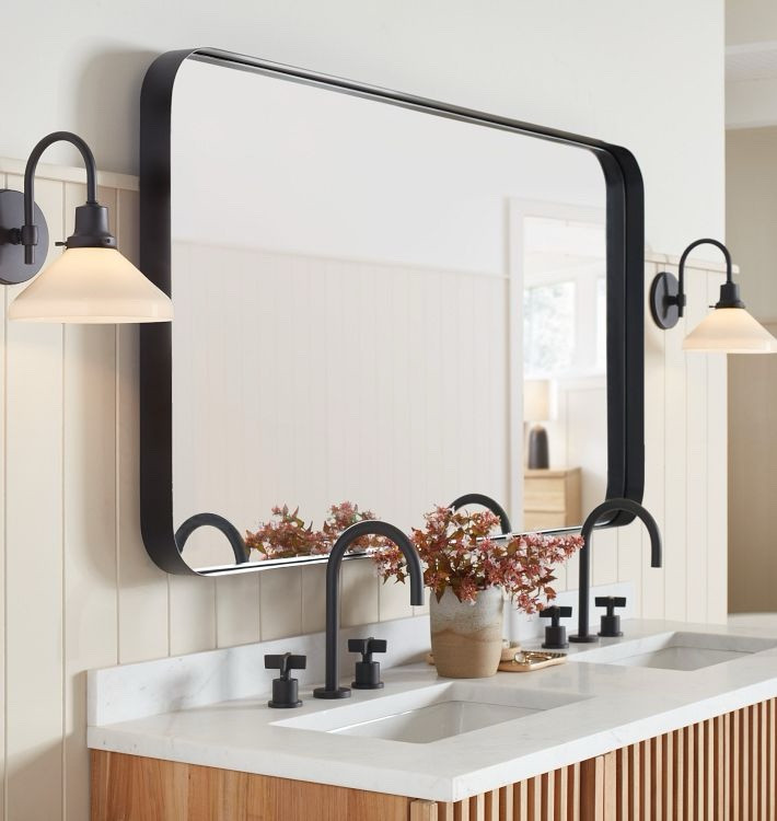 This modern chic wall mirror features a very cool deep rectangular solid brass frame. The black finish is industry-chic while the gold brass finish  elevate any space with a touch of glam. Love the rounded corner—very inviting. Now extra 20% off clearance with code EXTEA20 at @Rejuvenation. #wallmirror #walldecor #homedecor

#LTKSaleAlert #LTKHome