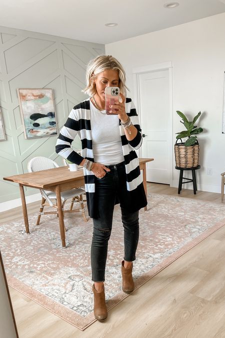 Long black and white striped cardigan
Wearing medium—runs small, size up one or two 
$33 
Lots of colors 

Jeans and boots are true to size 

#LTKshoecrush #LTKunder50 #LTKsalealert