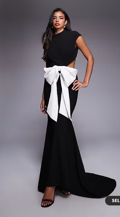 Honestly… this bow is doing everything for me 🎀
It just makes the whole dress feel so perfect for holiday parties — classy but still gives that festive pop!

#sellingfast #holidayoutfit #asosfind 

 #LTKGiftGuide #LTKHoliday