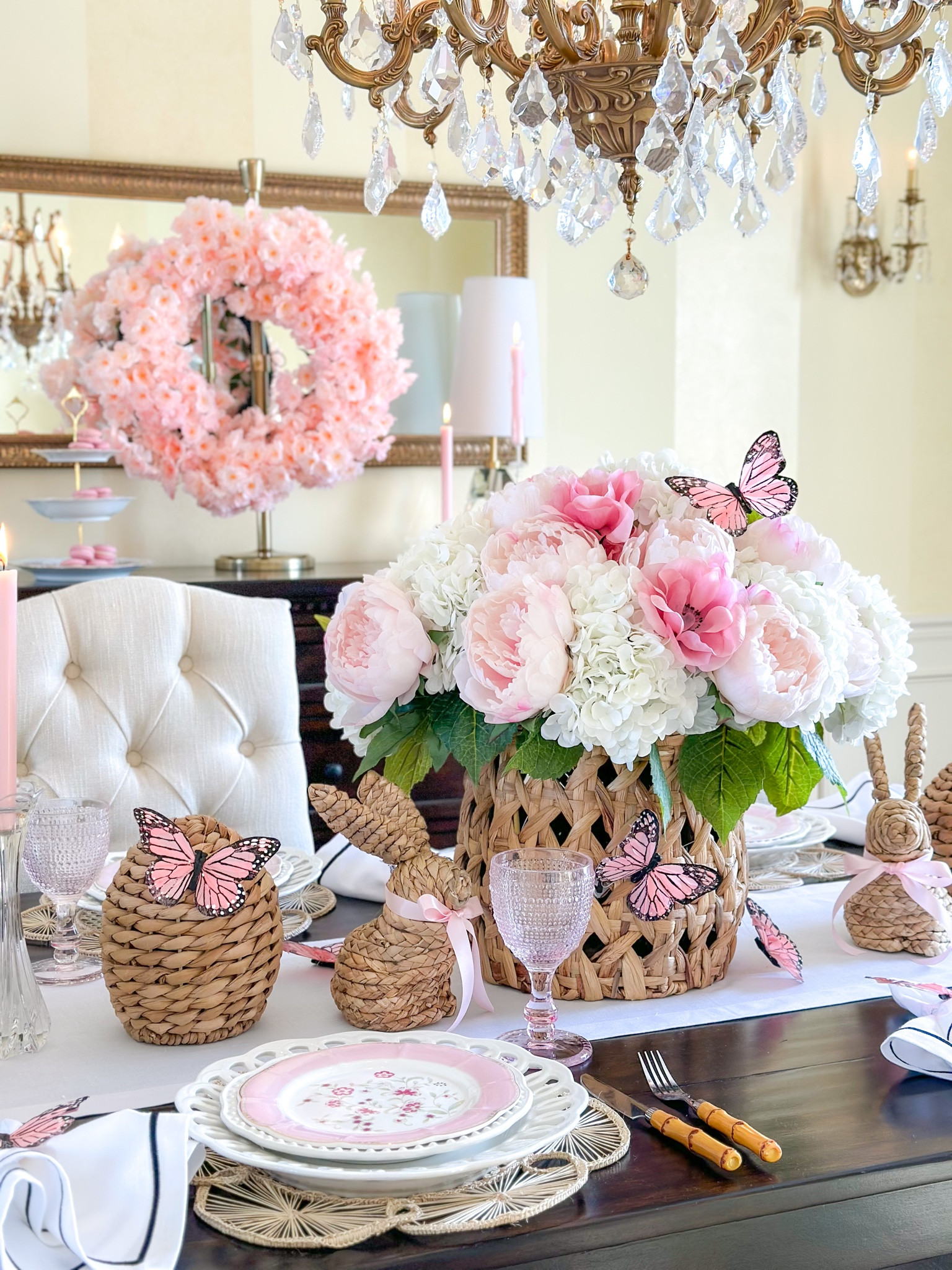 Shop my Easter table! 

Spring table, Easter tablescape, spring decor, pink decor, woven basket, target finds, butterflies, cherry blossom wreath, faux flowers, spring flower arrangement, hydrangeas, peonies, poppies, woven bunnies, pink plates, pink glassware 

#LTKhome #LTKSeasonal #LTKFind