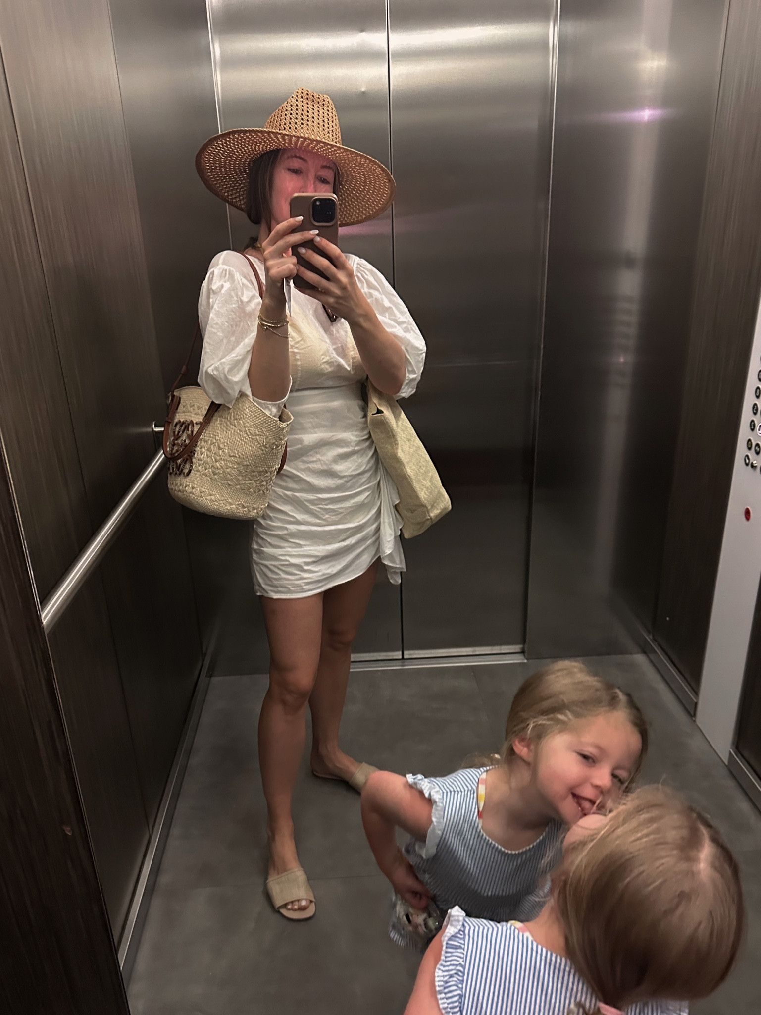 The dress is the Rhode Pia dress that I cannot find online but Poshmark might have! Wearing a M in the hat. I have a big head though😂