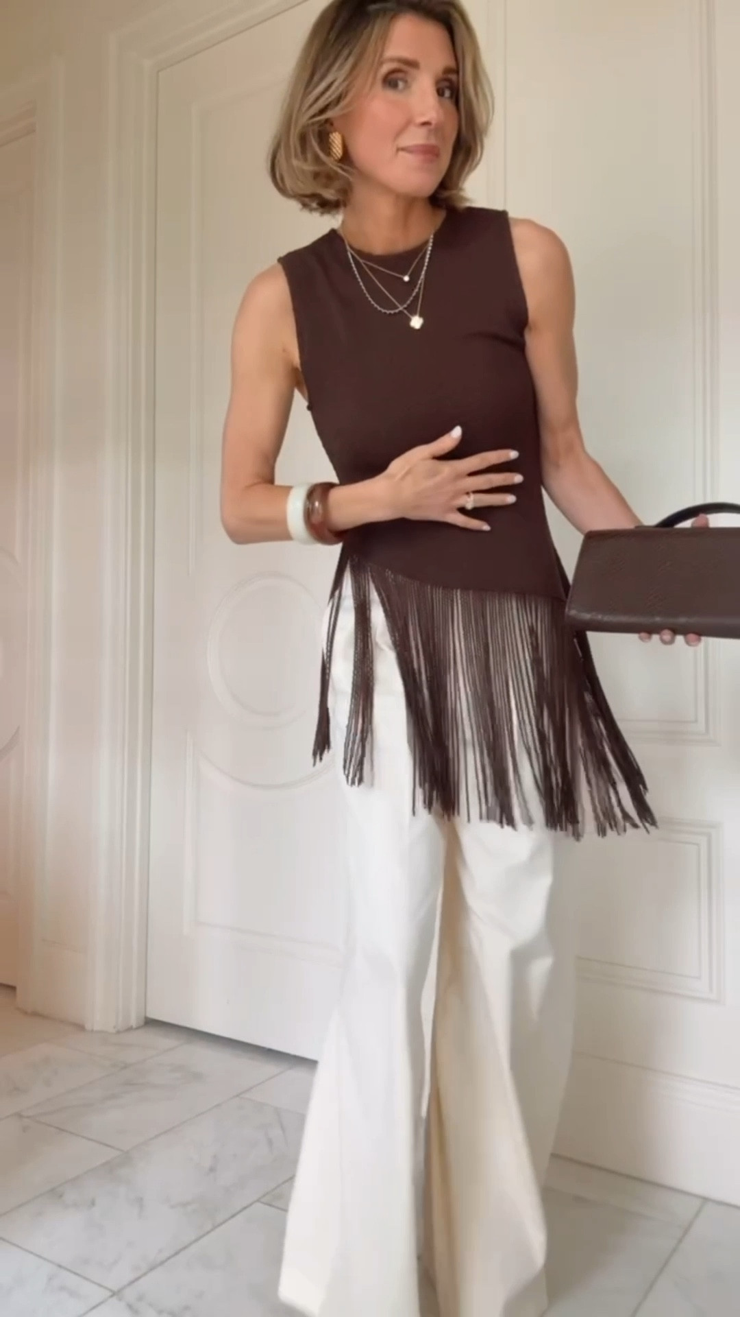 @Zara spring new arrivals are SO good this year 🤎 This fringe top is such a fun piece and chocolate brown is a soft way to wear a darker neutral into the new season. Wearing size small in tops + XS in bottoms.

#LTKootd