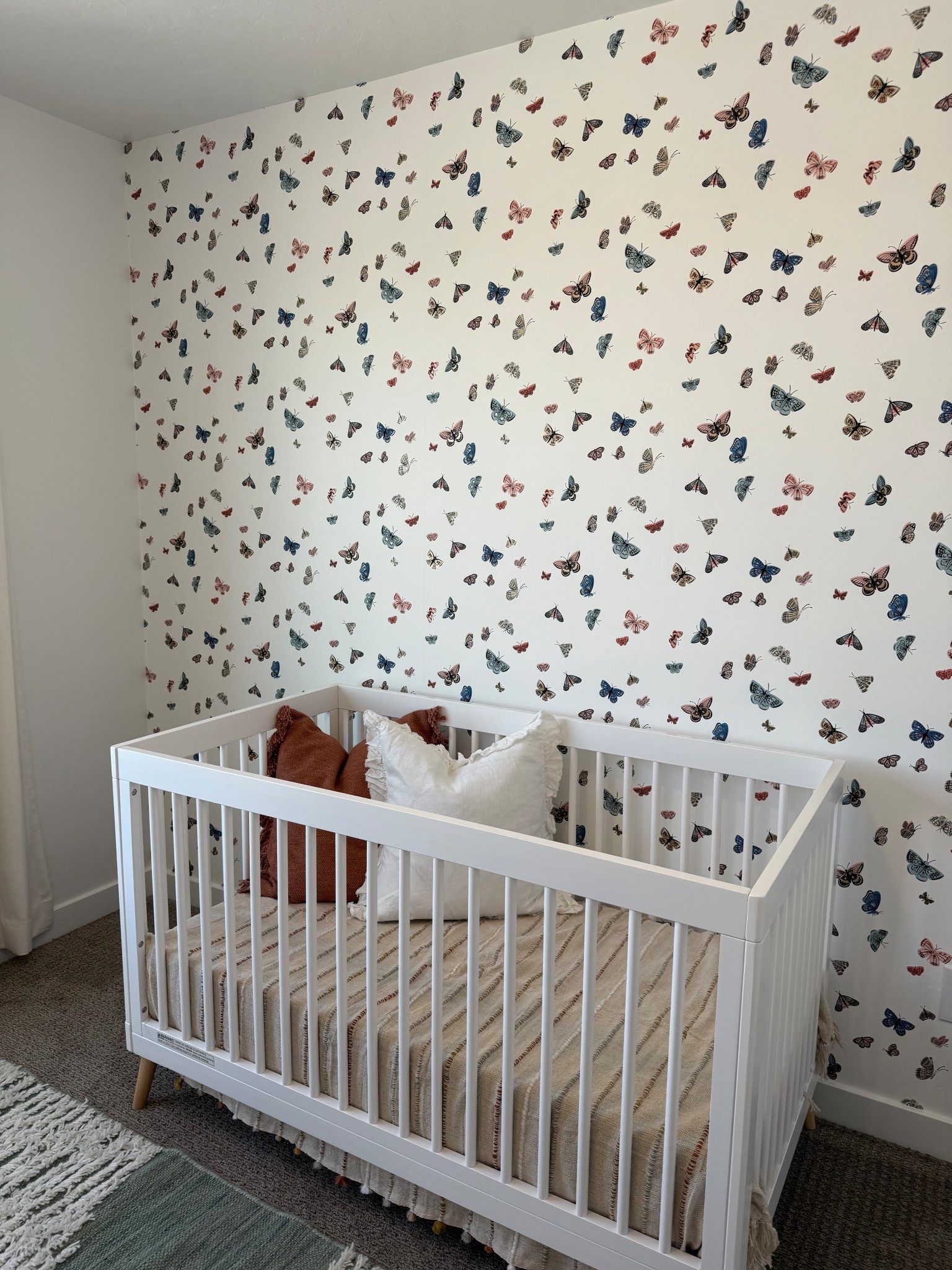 Peaceful and whimsical nursery inspiration for baby. The butterfly wallpaper is the perfect touch to add a little fun into the room. 

#LTKBump #LTKHome #LTKBaby