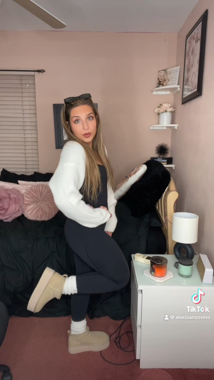 Outfit is from Tik Tok re-creating Pinterest inspired looks from my closet 📌 I have all the exact items linked as well as some dupes. 

Sweater Shrug- medium/large 
Jumpsuit- small 
Uggs- size 7 

Tik Tok-alexisanzovino 

#LTKmidsize #LTKVideo #LTKHoliday