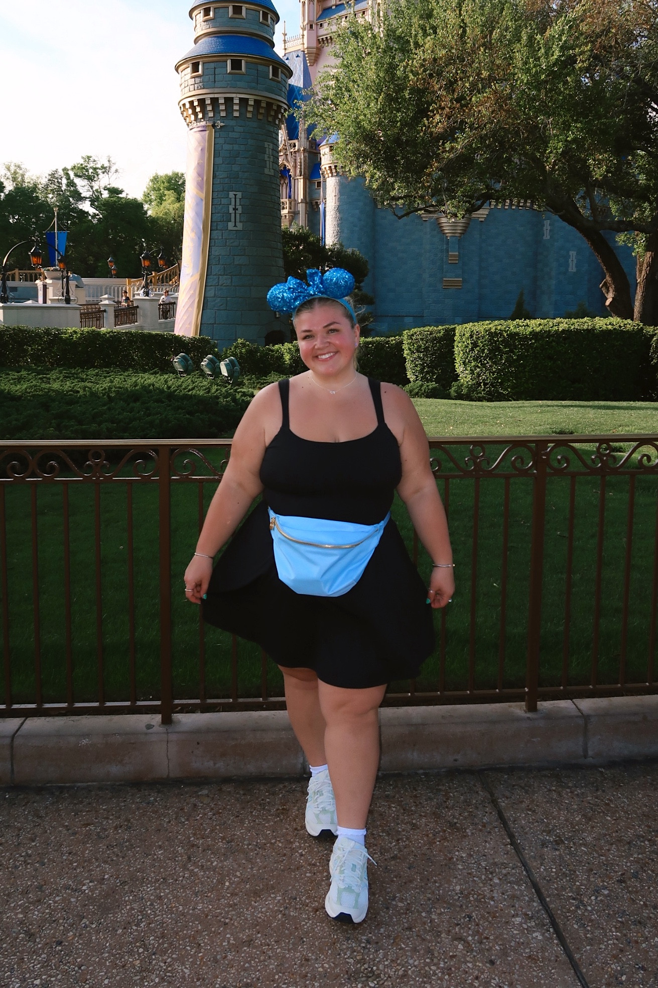 thick thigh chaffing girlies, this is one of my favorite types of outfits to wear to the parks! i love the jumbo fanny packs for holding anything i could need & workout dresses to look cute but also stay comfy in the heat! i couldn’t find this exact dress because i think i got it on the clearance rack but i linked another one i got from them that fits the same just slightly different on the back! im wearing an xl! and i never have issues with my new balances when it comes to my feet hurting more! i always wear these, my hokas, or any type of well made running shoe! 

#LTKtravel #LTKfitness #LTKplussize