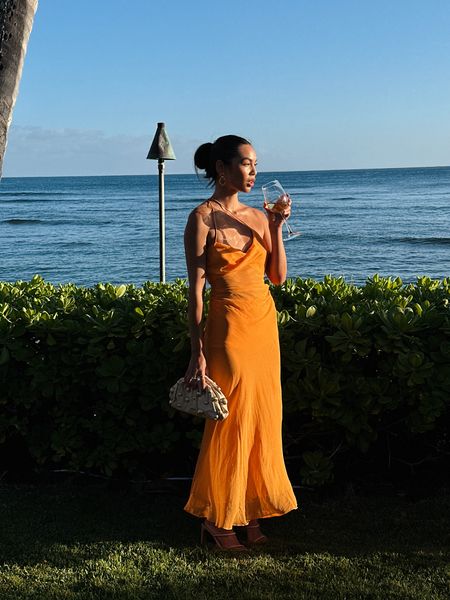 black tie optional wedding in Hawaii. I’m a sucker for wearing a colorful dress especially for a warm wedding. This dress from the sei is asymmetrical and sheer but comes with bottoms to wear under. Clutch is from cult Gaia and is always a good statement piece. Tony Bianco heels that are nude so it’s so easy to wear with any dress and can go on grass  

#LTKwedding #LTKsalealert #LTKparties
