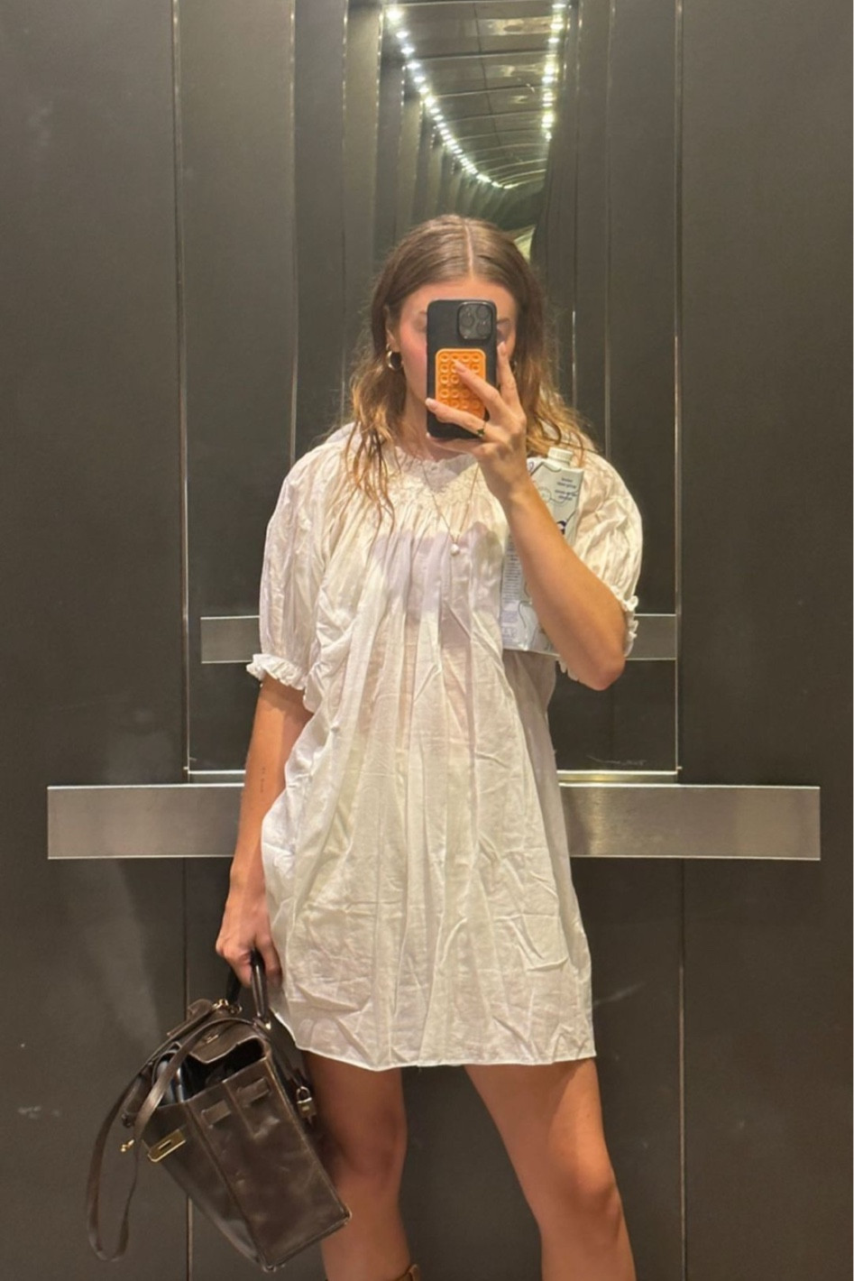 Allegra Shaw wears a white Doen dress with her Hermes Kelly

#LTKSeasonal #LTKstyletip #LTKFind