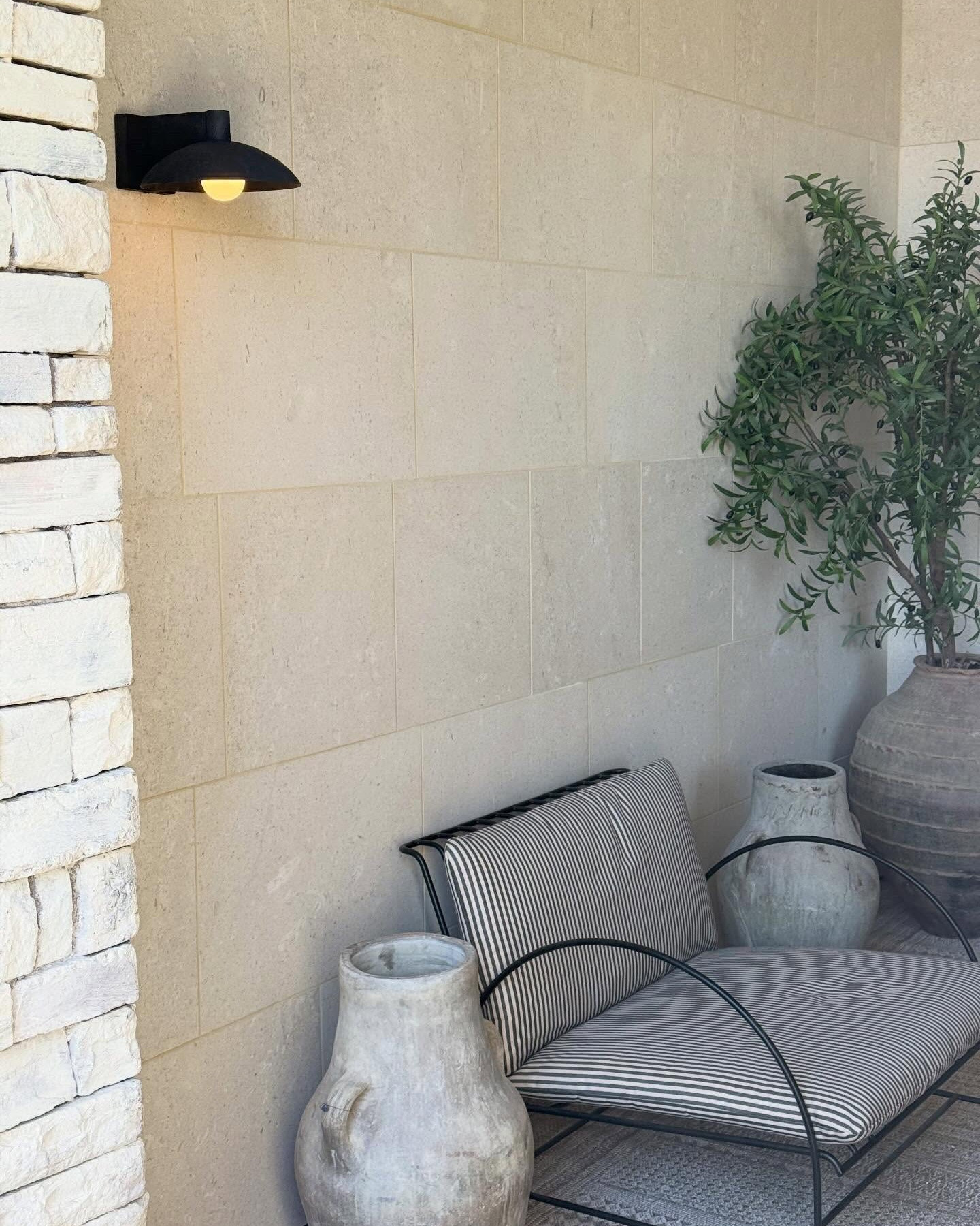 I did something a little unconventional for the outdoor sconces in the front entryway.

we concealed all the hardwiring and in the sconces before installing

and then I just used a rechargeable bulb. We already have adequate lighting at the top, and these were just for added ambiance and look, and I didn’t plan/nor did I want to go through the hassle of hardwiring. 
When I love a sconce, this is the best solution for me personally.

So buy that scone and just get a rechargeable bulb. I promise it’s worth it.