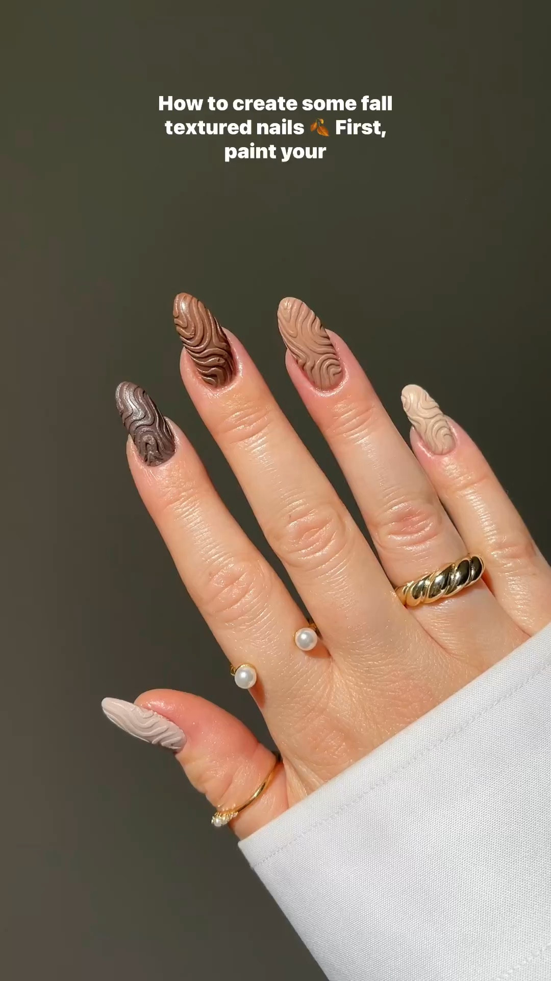 How to create fall textured nails ☁️

1st Paint your gel, and cure.
2nd Paint matte top coat, and cure.
3rd Use a fine brush to paint your design but don’t cure it.
4th Pour the dip powder over the entire design.
5th Cure your nails.
6th Brush off the dust, and your are done.

Links in my bio. 🫶🏼

*pr 

#nailtrends #texturednails #neutralnails #monochromatic #fallnails #swirlnails

#LTKstyletip #LTKSeasonal #LTKbeauty