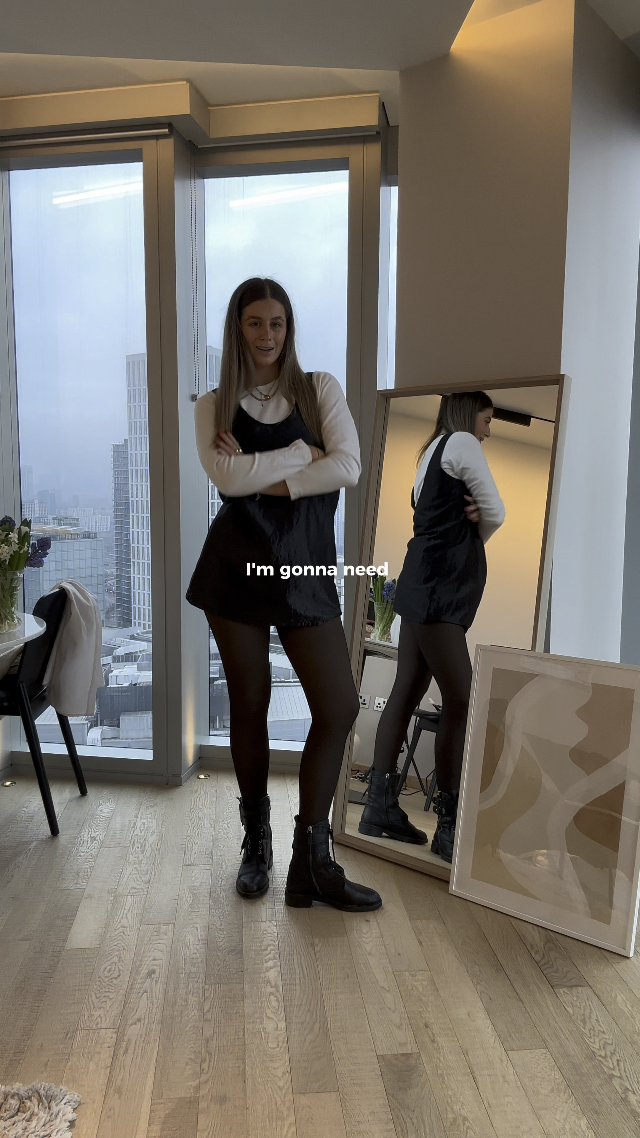 Black thermal tights, leather biker boots, white long sleeve top, black mini dress, pinafore, long black wool coat 

#LTKworkwear #LTKMostLoved #LTKstyletip