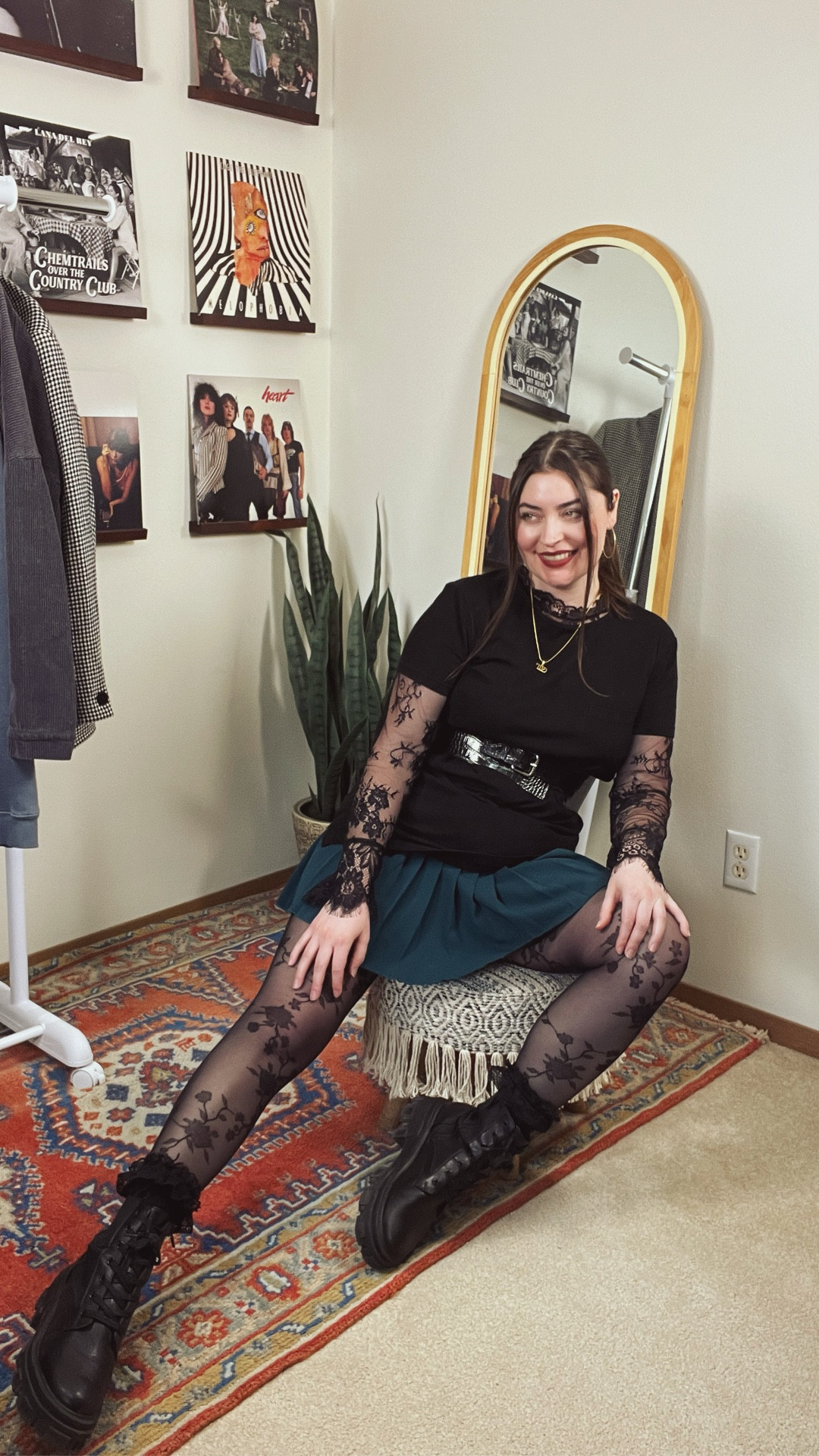 Date night, but make it alt girl 🖤

This outfit started as a simple t-shirt dress, but the layers did all the work:
lace sleeves, a waist belt, and a teal pleated skort for that pop of color.

Finished with floral tights + combat boots for the ultimate grunge girl date night look.

Edgy, flattering, and easy to recreate.

Save this for your next date night fit ✨

#LTKootd #LTKgrwm #LTKMidsize