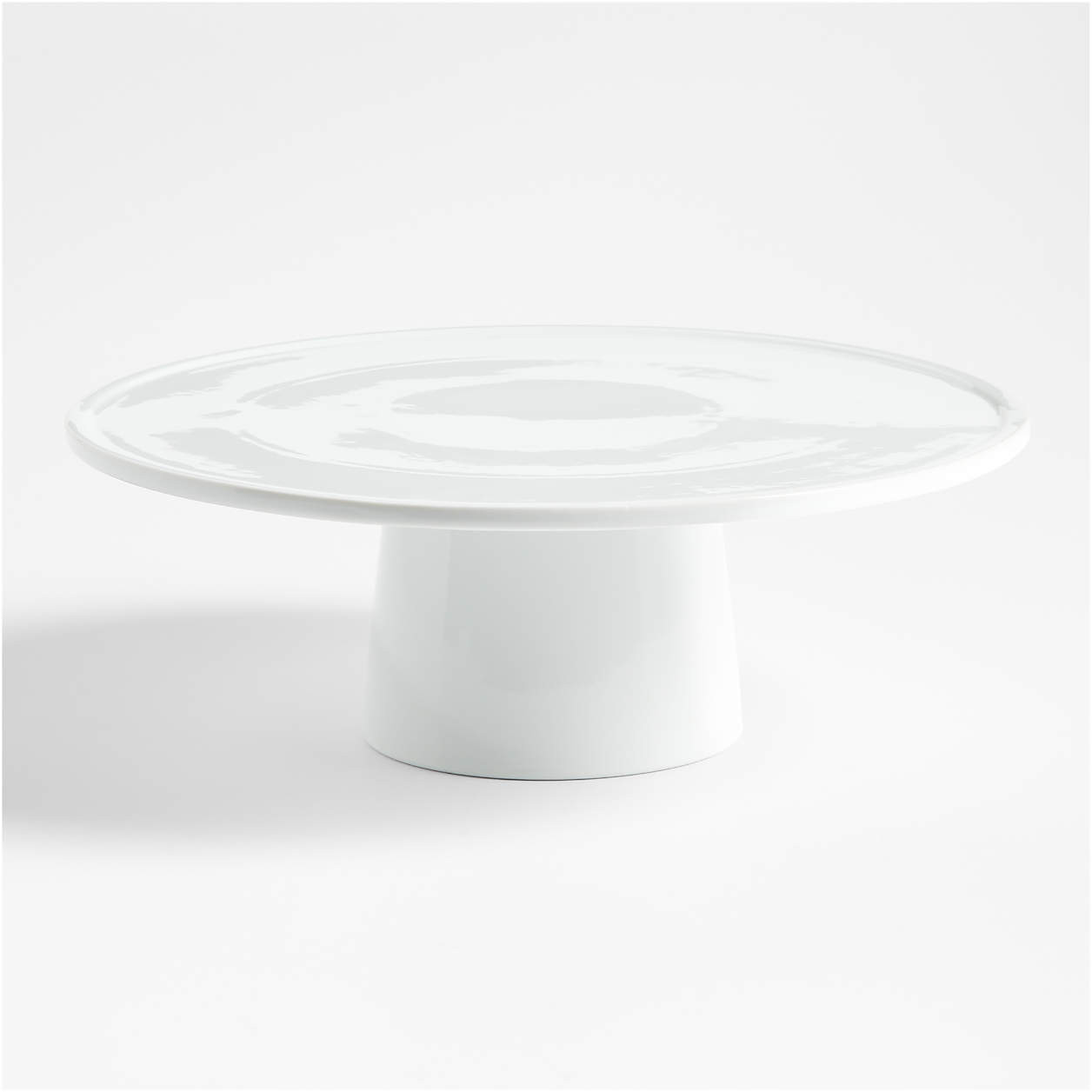 Form Round White Ceramic Pedestal Cake Stand + Reviews | Crate & Barrel | Crate & Barrel