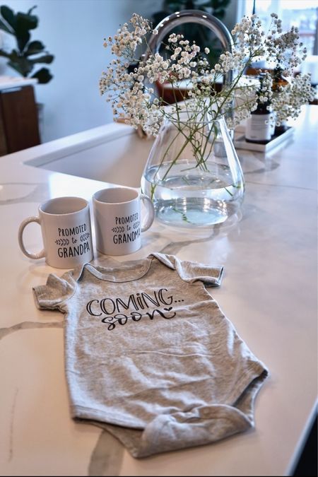How we told our parents we were expecting! 🤍 Pregnancy announcement present idea for grandparents - mugs and coming soon onesie come together, couldn’t be easier!! 

Pregnancy announcement, pregnancy reveal

#LTKbump