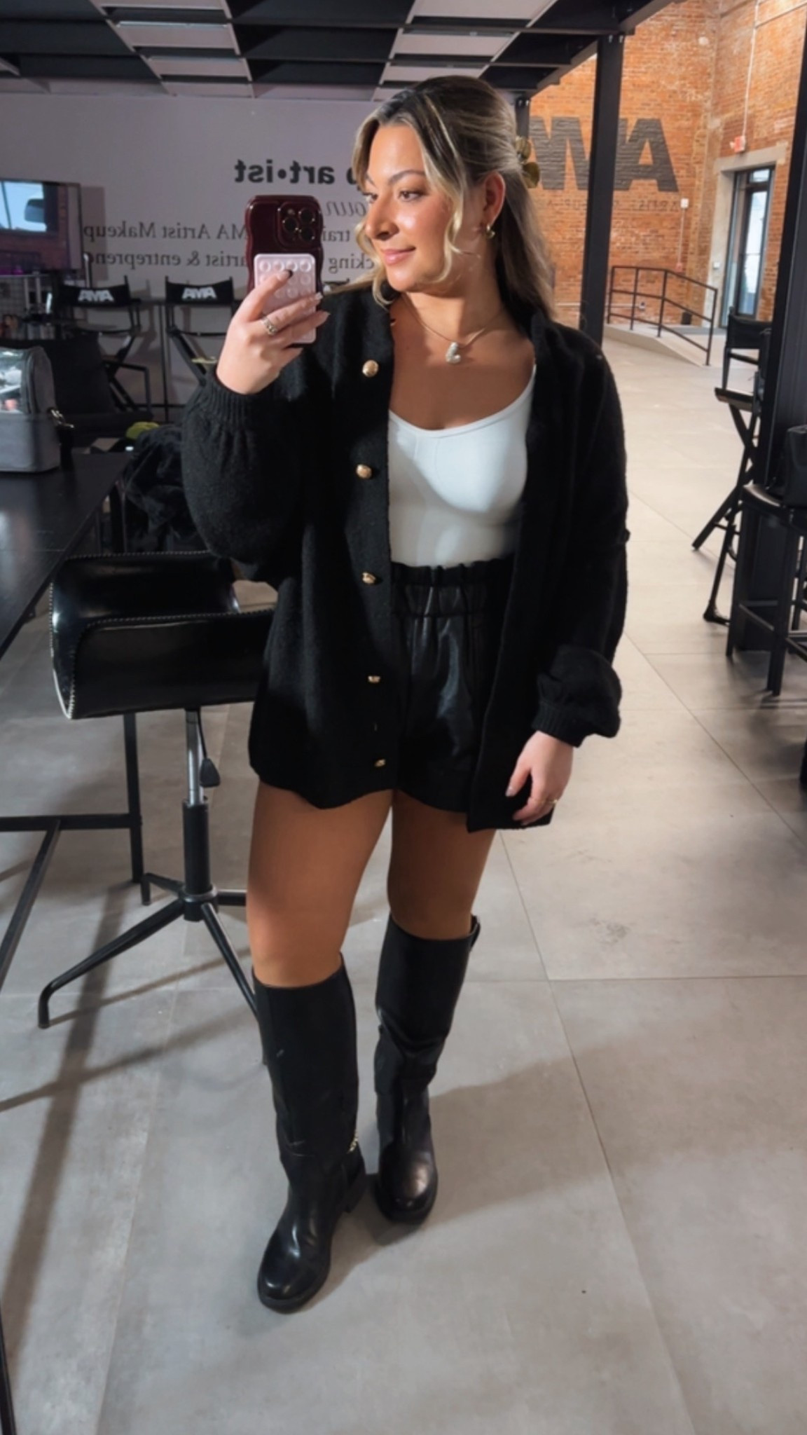 Today’s work OOTD
- black cardigan with gold button accents
- white waist slimming bodysuit
- faux leather black shorts
- black boots with gold accent chain 
- j bubble necklace 

#LTKBeauty #LTKSpringSale #LTKWorkwear