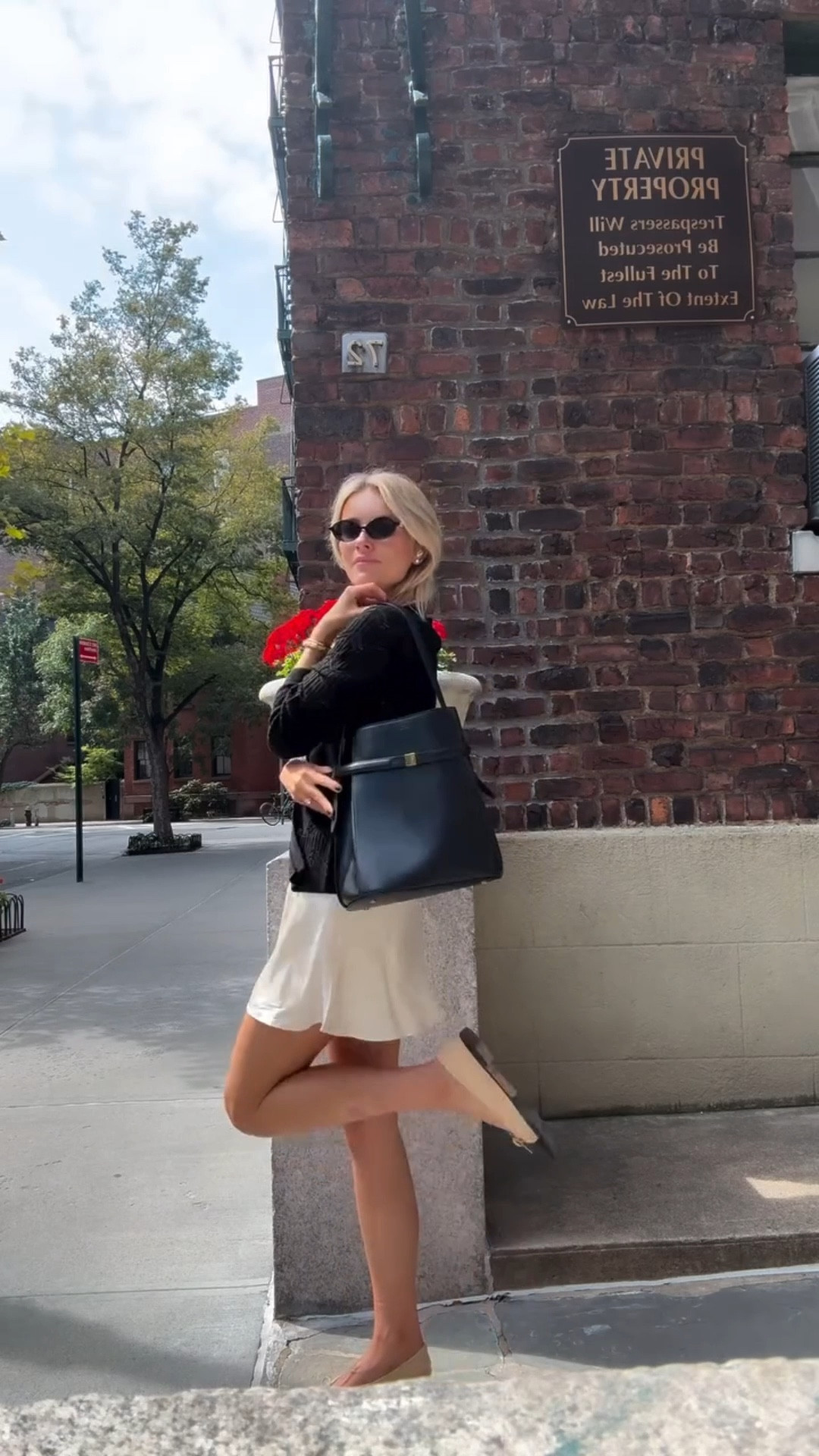 Fit checks in my cutie courtyard are limited! Wearing @fewmoda skirt and sweater 🖤

#LTKSeasonal #LTKItBag #LTKStyleTip