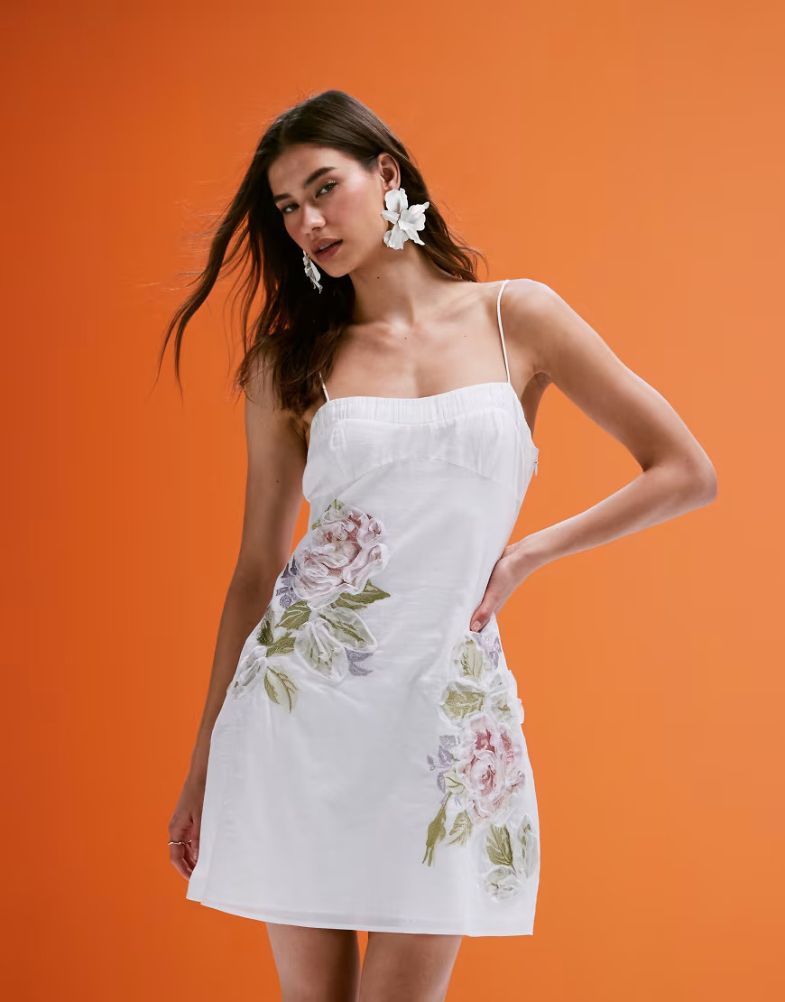 ASOS DESIGN embroidered cami mini dress with ruffle floral detail in white | ASOS (Global)