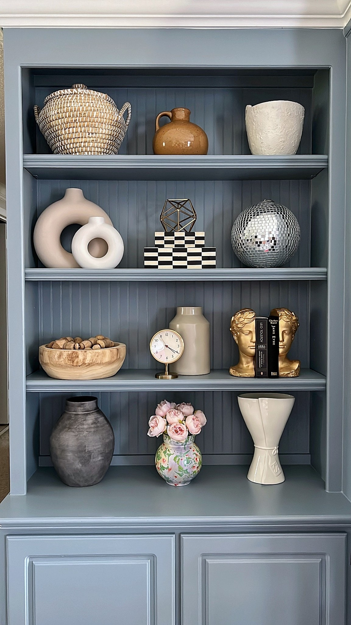 Cabinet & Shelf Decor | A Quick DIY Home Project 

The paint color I used was Sherwin Williams - Morning at Sea for this DIY project. And I love how it turned out. I just need to add knobs for the cabinets and maybe some lighting for the shelves. Some of the decor is old, but I linked what I could or found something similar. 

bookcase styling, bookcase decor, amazon decor, amazon home decor, amazon decor finds, amazon finds, target decor, target home decor, target finds, neutral coffee table books, marble bookends, Living Room Decor, Built In Cabinets, Shelves staging and decor

#homedecor #neutralhome #bookcase #shelfstyling #interiordesign #decor #shelfdecor

#LTKHome #LTKStyleTip #LTKSeasonal #LTKFindsUnder50 #LTKSaleAlert #LTKFindsUnder100 #LTKFamily