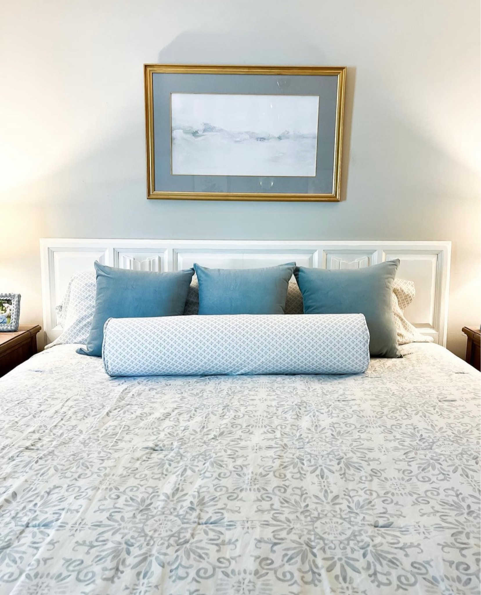 Older picture, but same art and comforter I use now. I had the matching bolster made from the top sheet of this bedding set. The frame and matte are thrifted. A great way to make the art more affordable is to know the size you need and thrift the frame and mat before you officially purchase the art. 🖼️ 

#LTKstyletip #LTKhome