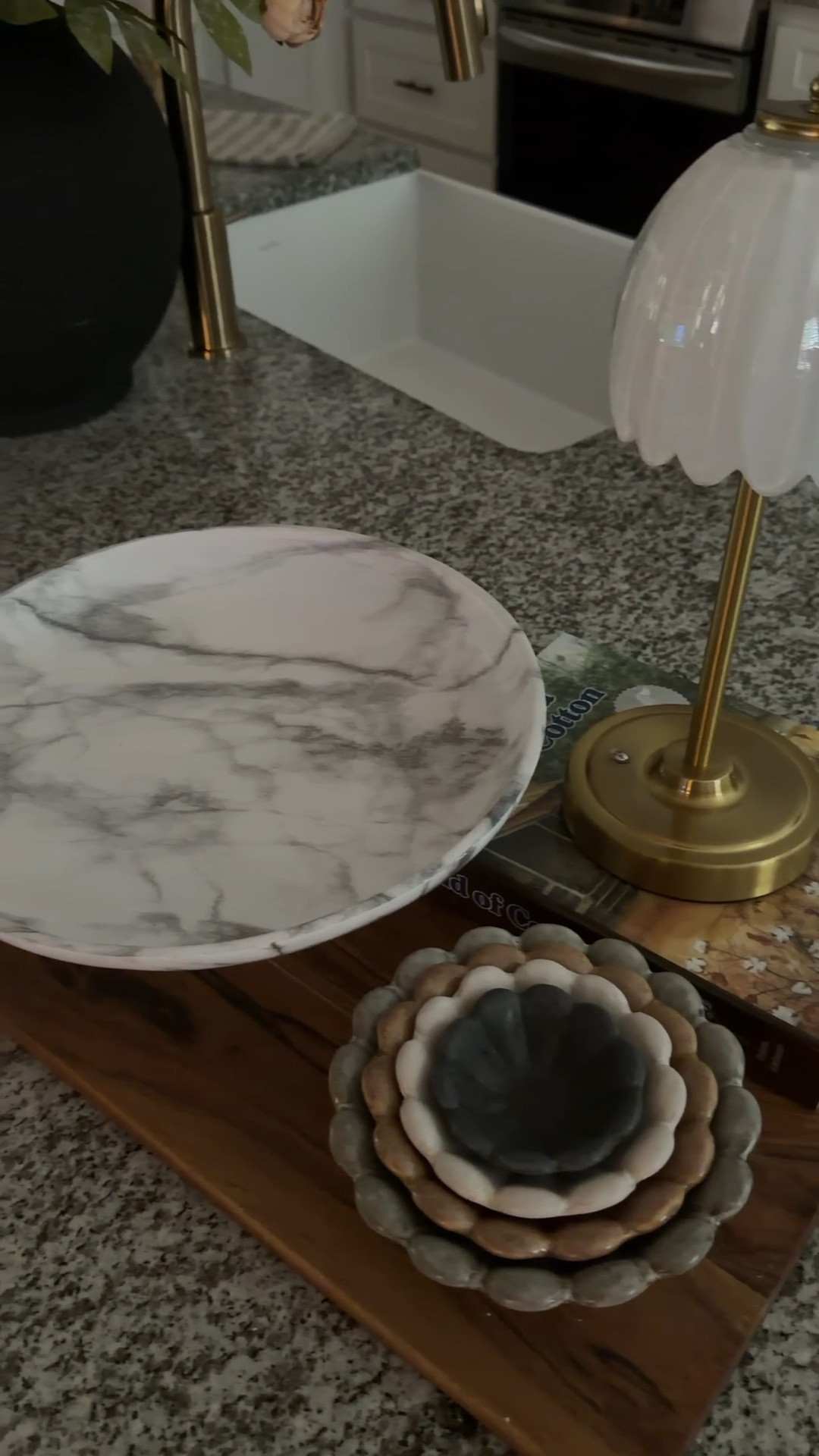 This beautiful, simple, and functional bowl is not only budget-friendly but also adds a touch of elegance to your kitchen counters. You can use it to store fruits and candies, or fill it with orbs or moss balls. I’ve even added a small lamp and a set of small bowls for your spices while cooking. The marbled design makes it a beautiful addition to any space in your home. 

Use code “WZAGP63T” for a discount on the marble bowl! 😍