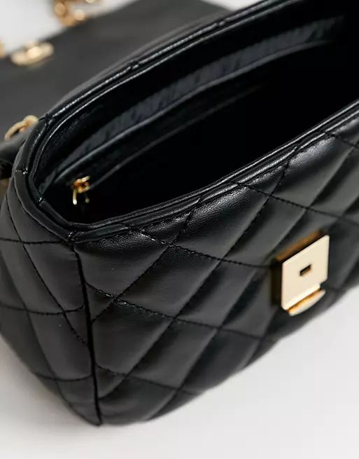 Valentino Bags Ocarina quilted cross body bag with chain strap in black | ASOS (Global)