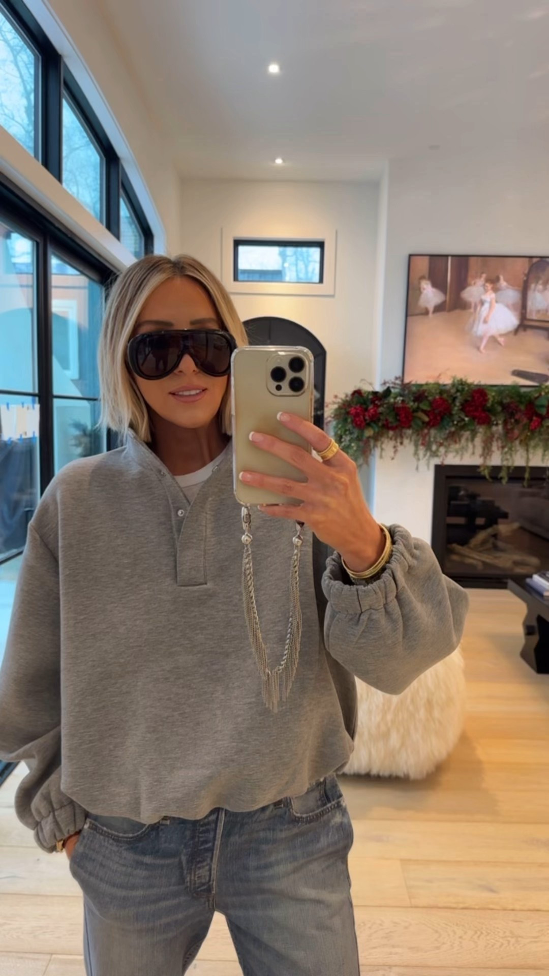 This H&M top for less than $30.00 paired with viral sweatpant denim and super cute and cozy winter flats 