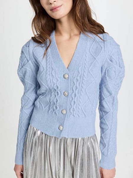 Adore the details on this blue sweater! #sleeves #buttons #cableknit

#LTKHoliday #LTKfamily