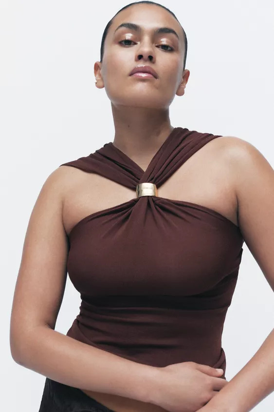 Halter neck top with a gold appliqué and wide straps. | Zara UK