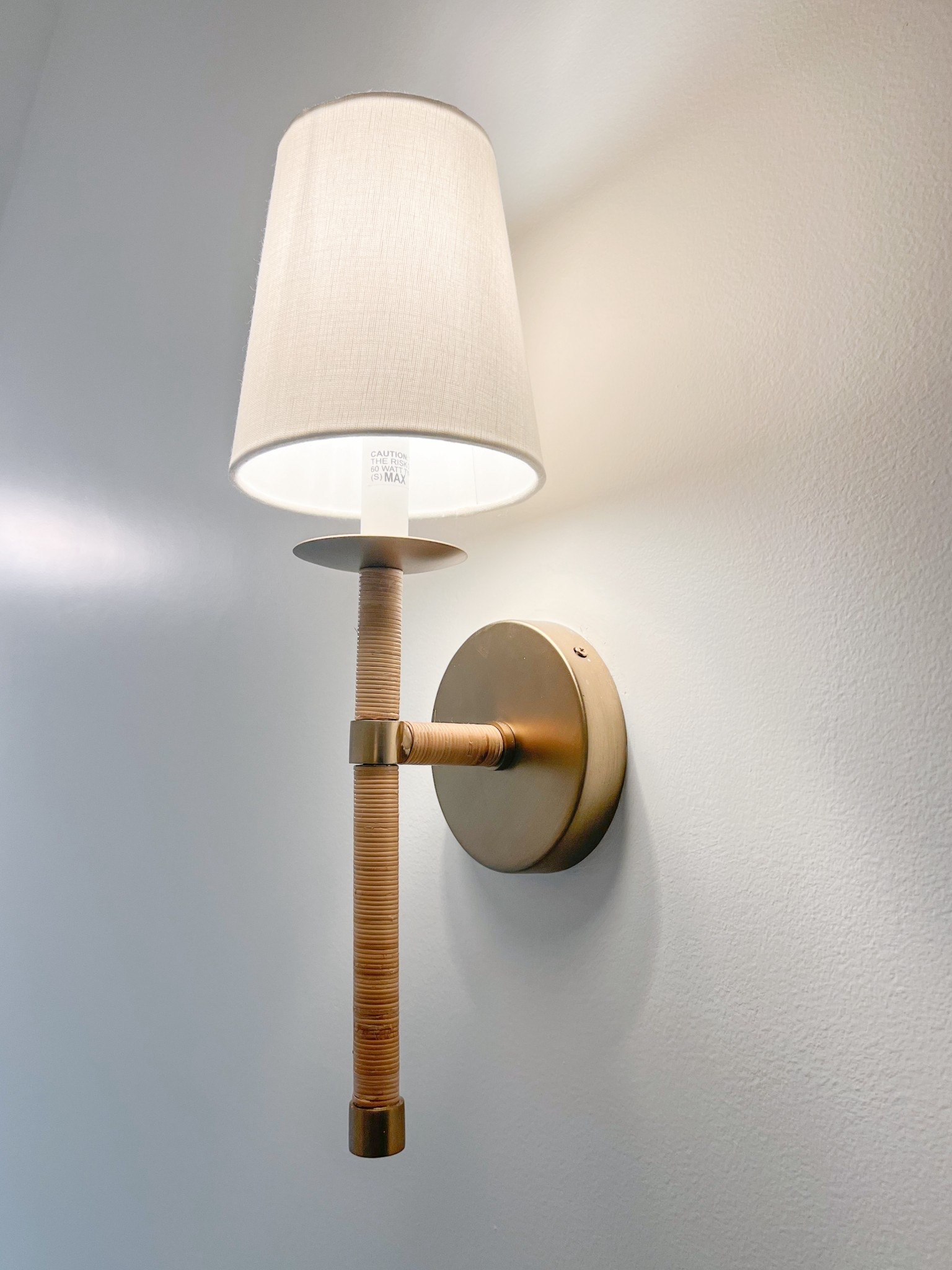 This woven sconce that I have in my upstairs hallways is a great Ballard Designs "look for less!" I love the rattan detail and the brass really warms up our space!
-
Amazon lighting, amazon wall sconce, wall sconce, coastal home, coastal style, coastal interior, coastal lighting, beach house, coastal home decor, beach home style, coastal decorating, neutral home, neutral aesthetic, woven wall sconce, designer look for less lighting, amazon sconces, amazon home decor, beach house decor, beach house lighting, amazon lights, woven sconces, indoor sconces, hallway lighting, living room lighting

#LTKHome