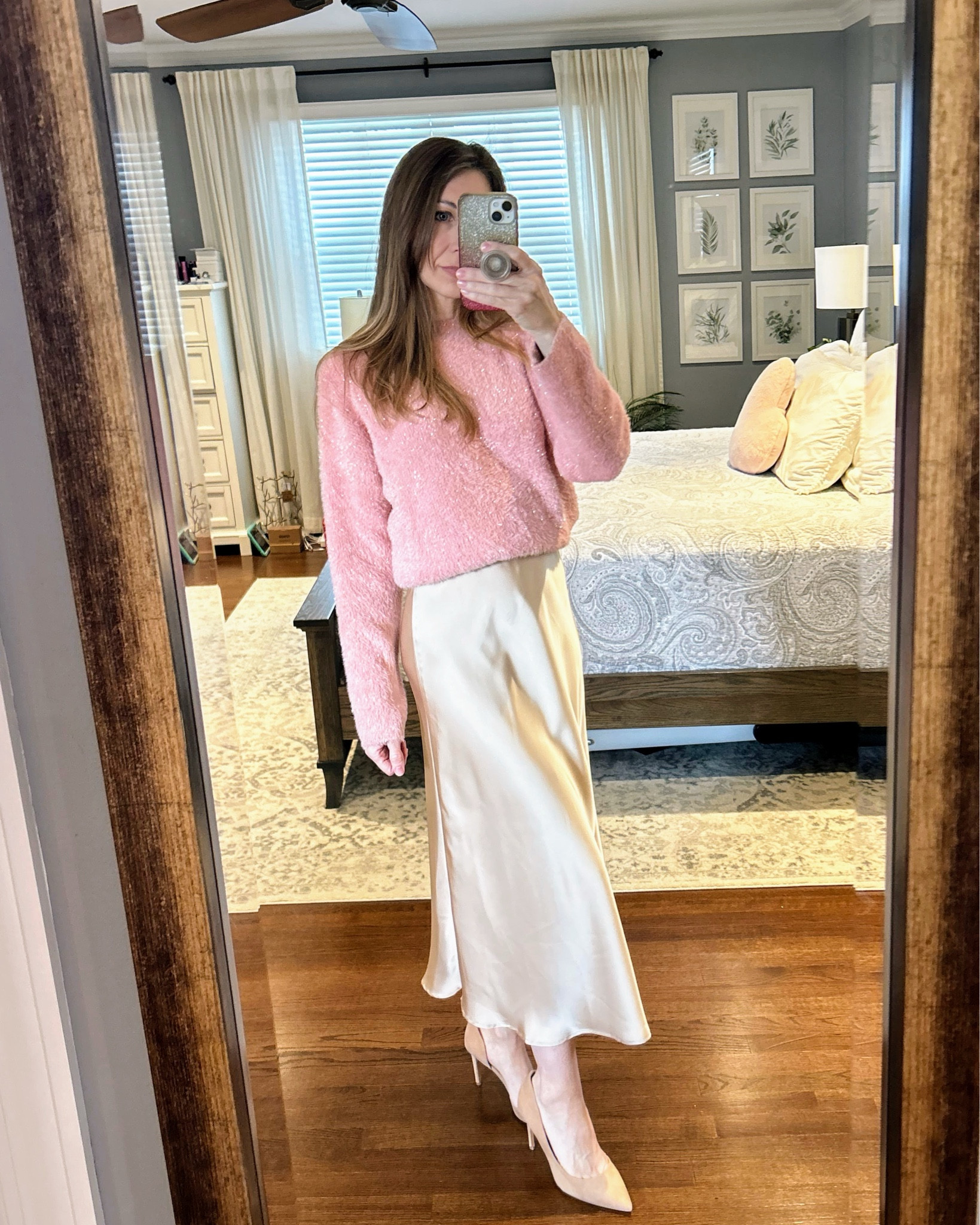 My daughter requested that I wear this pink sweater to her recital last night. I love this sweater (from Loft about a year ago), and wanted to pair it with a satin skirt. I love how it came together, but it was sooo cold outside, I switched to trousers with fleece lined tights underneath. I liked this look, too! Both of these would be great looks for Valentine’s Day, too! Which look do you prefer?

Tip: I used an elastic belt to hold my sweater in place with the skirt (see 2nd photo). Tucking the sweater into the skirt would have looked very bulky. I love this trick and use it with so many outfits.

Top - LOFT (purchased a year ago). I linked a similar sweater  

Skirt - Amazon, size S (color champagne)

Belt - Amazon

Shoes with skirt - Aldo, out of stock. For a similar look, try the Bandolino D’Orsay pump I’ve linked in the color "Beige Lizard”.

Shoes with Trousers - Bandolino, color “Cognac Lizard"

Trousers - Amazon, sz S (color Off White). Pair these with the off white belt I’ve linked from White House Black Market. Perfection!

Fleece lined tights - Amazon, sz S/M

Coat - (100% wool - it was nice and warm)


#LTKgrwm #LTKFindsUnder50