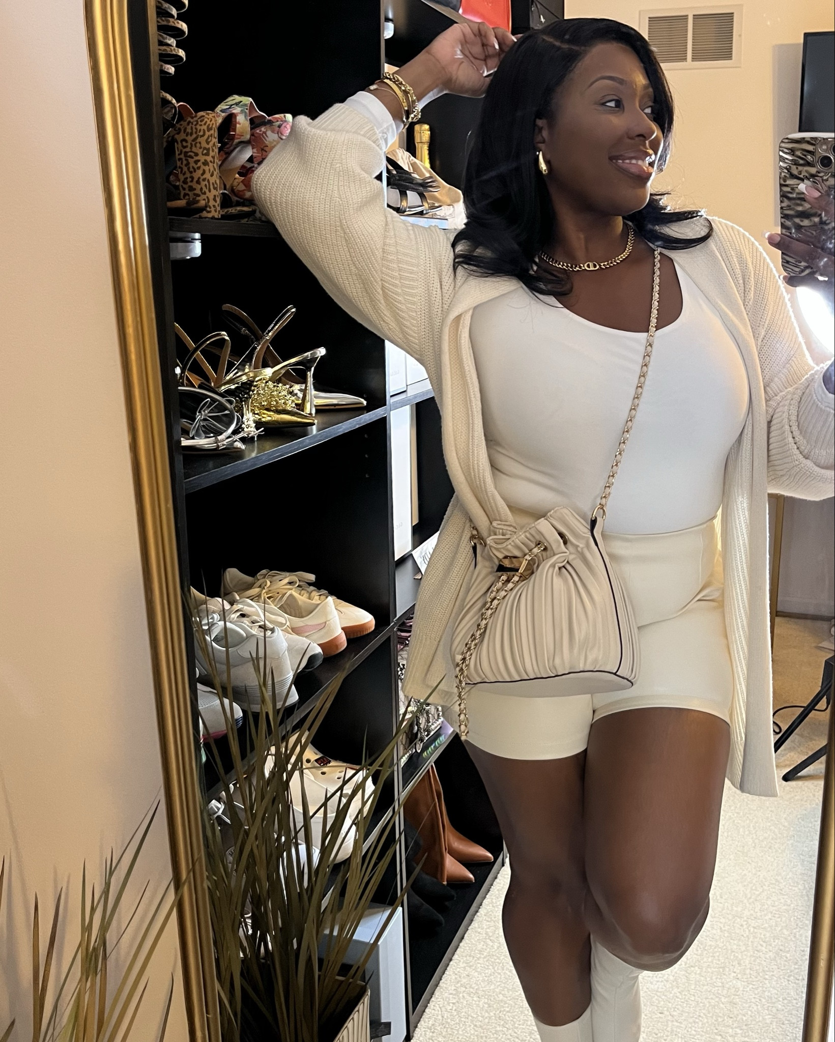 Cream and off white outfits just SCREAM luxury and soft life to me! This monochromatic look is super feminine and dainty. 

I would so wear this to grab a holiday latte or drinks with my girls!

#LTKItBag #LTKStyleTip #LTKMidsize