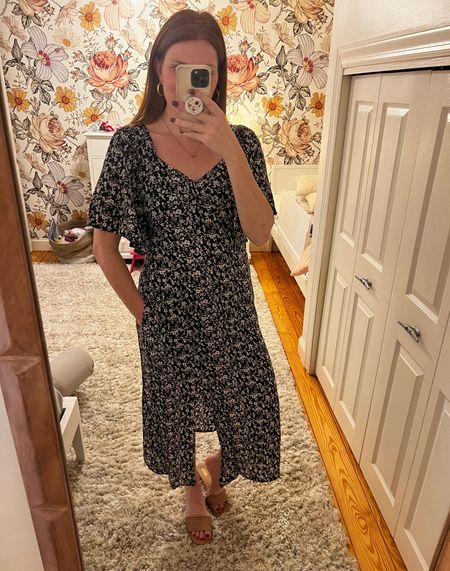 This dress is so good! It can be causal or dresses up with heels but it’s so flattering. Part of the back is smocked so it is so comfy too! I am in a medium, TTS and it’s only $35. Comes in this black floral and a pink floral

#LTKfindsunder50