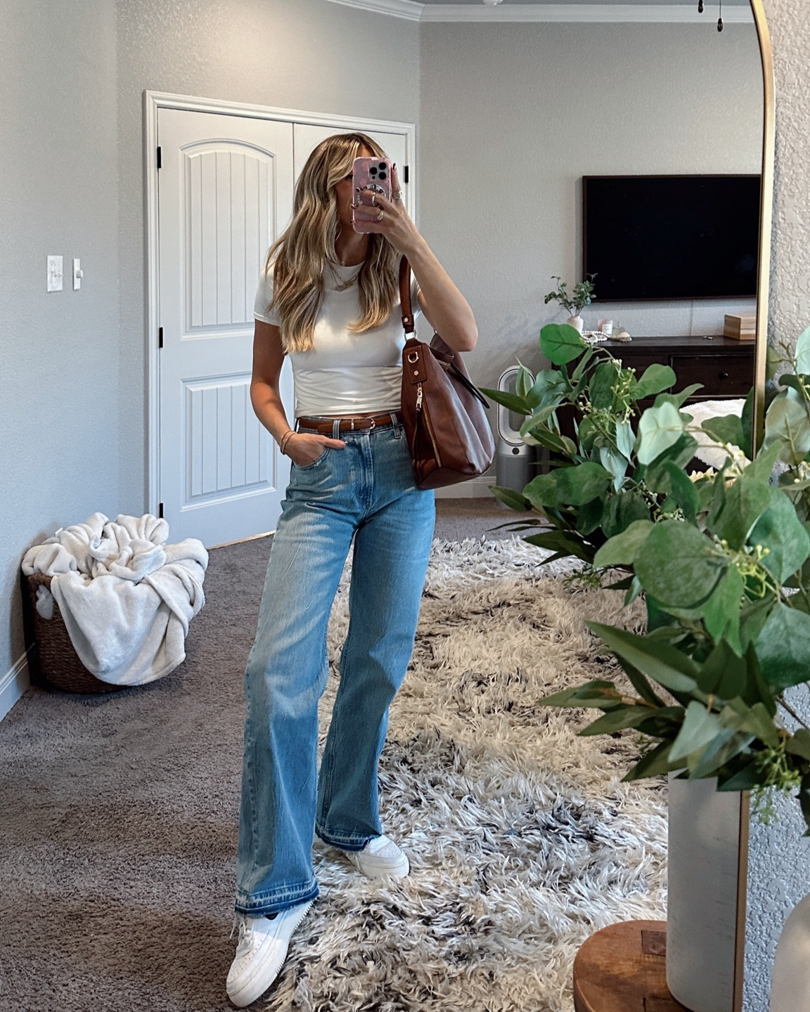 wearing my usual size small in this PERFECT white tee - which is currently on sale! wearing my usual 26 in the 90s relaxed jean! linking all accessories as well! amazon belt + amazon bag! 

#LTKSaleAlert #LTKFindsUnder100 #LTKFindsUnder50