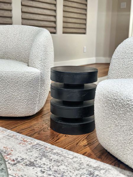 Floating Disks Side Table (13") and boucle swivel chairs. 

#LTKhome