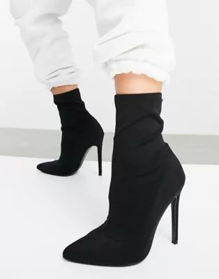 ASOS DESIGN Esmerelda high heeled sock boots in black | ASOS (Global)