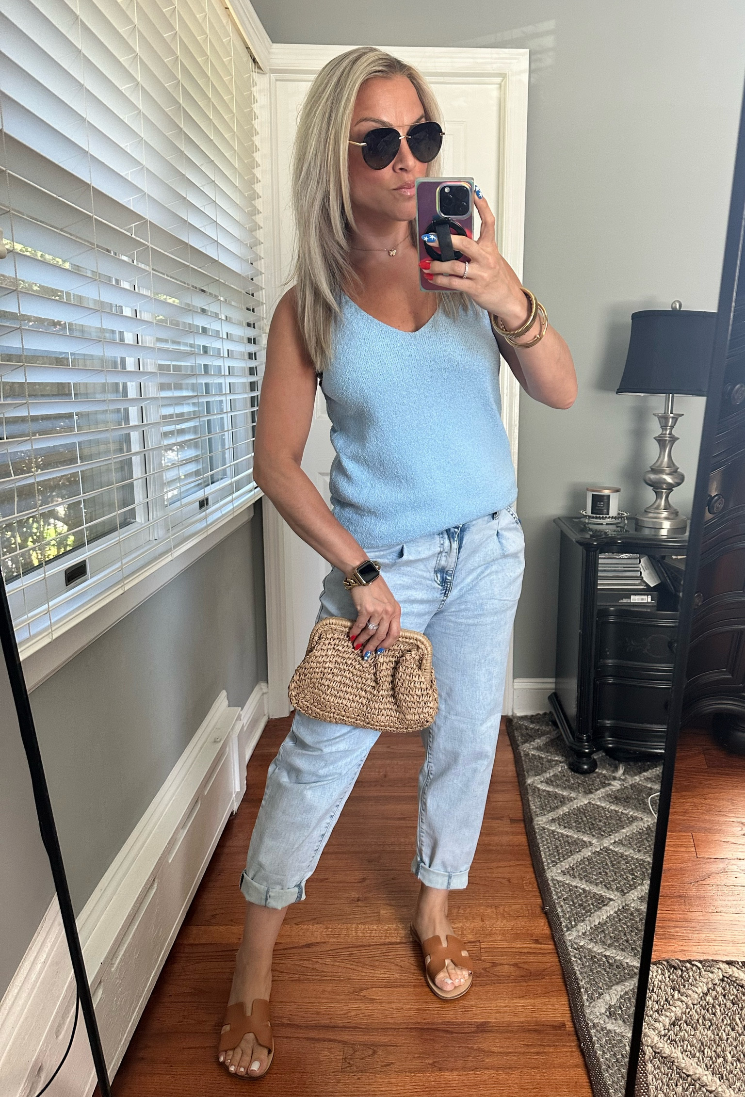 Casual Summer fit. Runs tts. Size small in blue knit tank. Comes in lots of colors. Size 4 in blue barrel jeans. Comfortable soft denim material. I cuffed the bottoms.

#LTKFindsUnder50 #LTKOver40