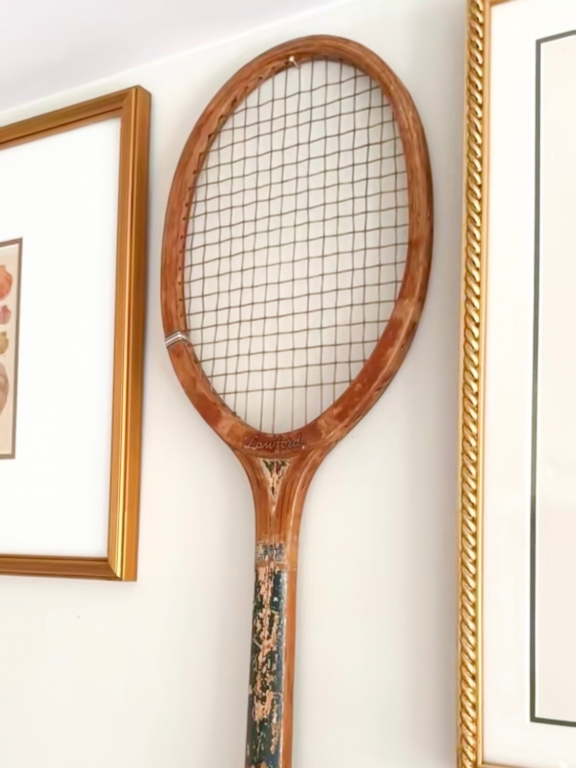 I found a vintage tennis racket at a farmers market earlier this year and love how it looks in a gallery wall! I’ve linked some similar vintage tennis rackets below in case you’re wanting a similar look. I think a pair hung together – or one hung horizontally – would be another great way to style these!

#LTKHome