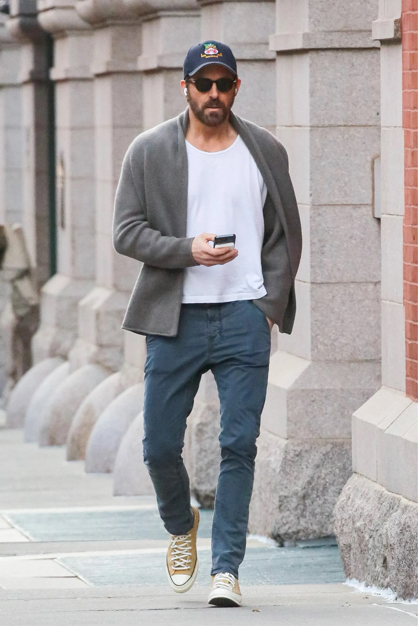 Ryan Reynolds wearing a shawl-collar The Elder Statesman cardigan, navy Nudie Jeans chinos, and tan Converse high tops  

#LTKStyleTip #LTKMens #LTKOver40