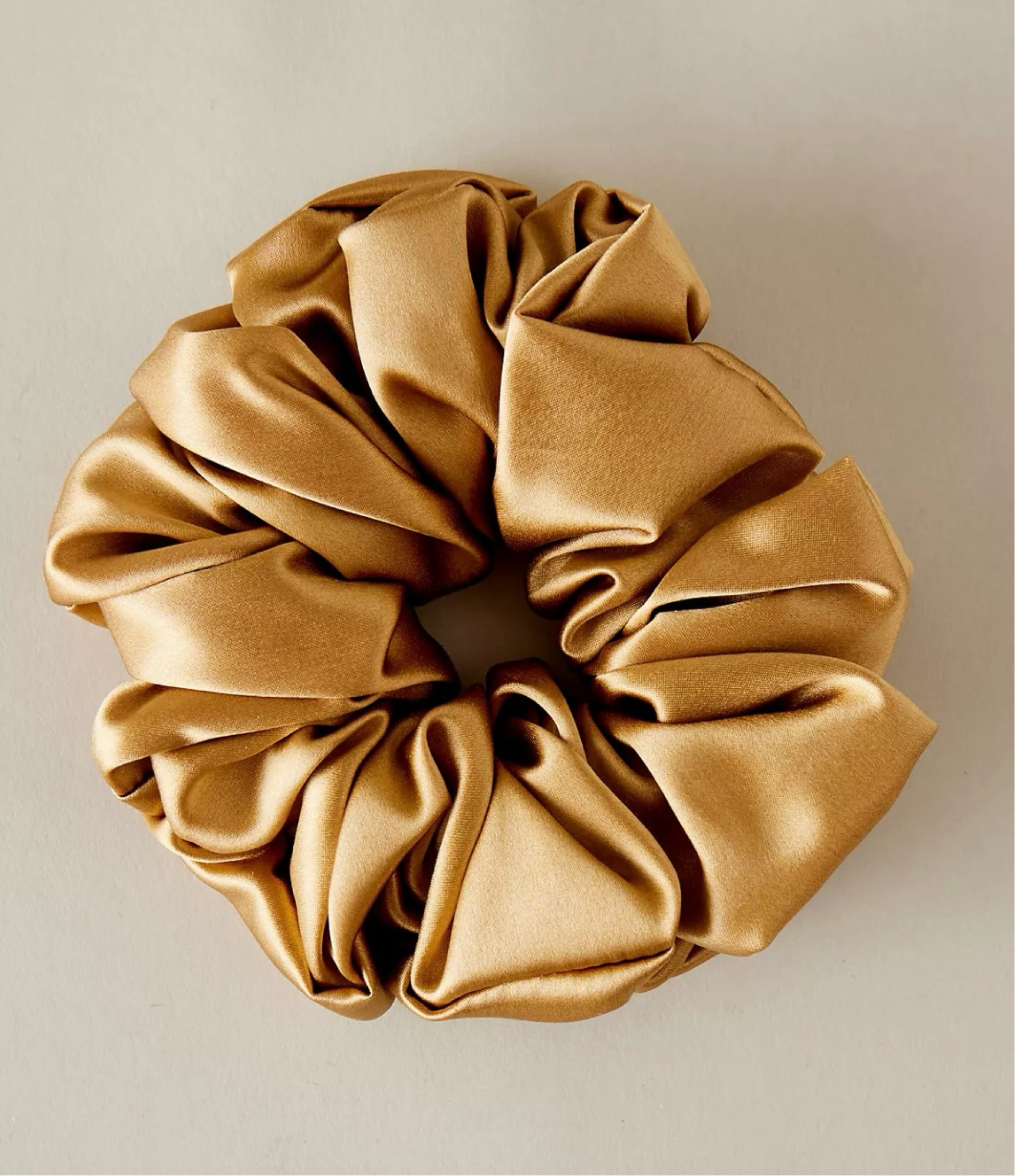 I have this - it’s such a luxe colour & excellent large size for maximum impact 

Really lifts a quick pulled back ponytail 

#LTKover50style #LTKautumn #LTKuk