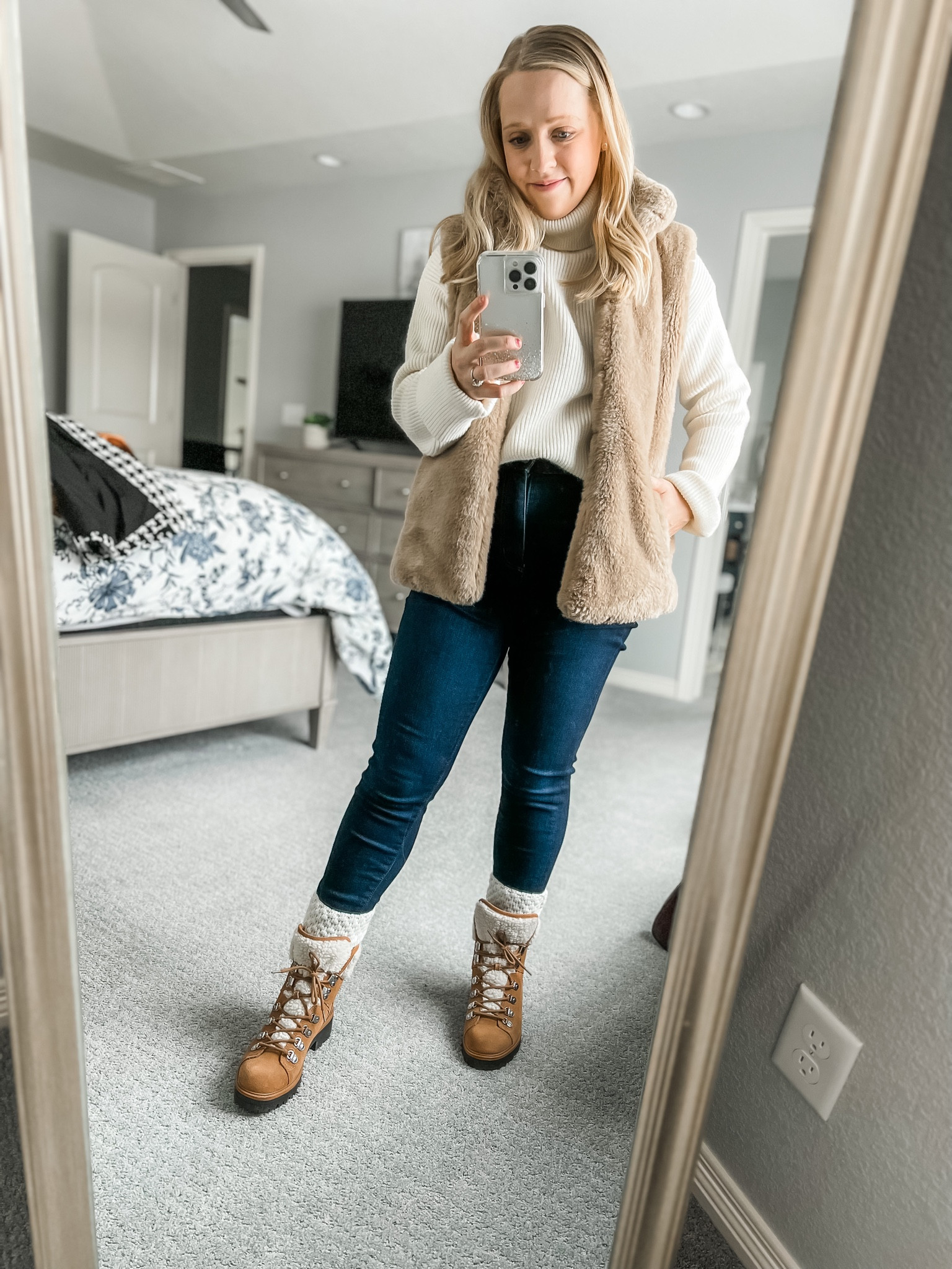 Paired a faux fur vest with lace up shearling boots for winter! Wear a size 7 in these snow boots and 4 petite in the dark wash skinny jeans! Ski outfit // ski trip // winter vacation // winter outfit // petite // faux fur vest // hiking boots // lace up boots // Marc fisher 

#LTKSeasonal
