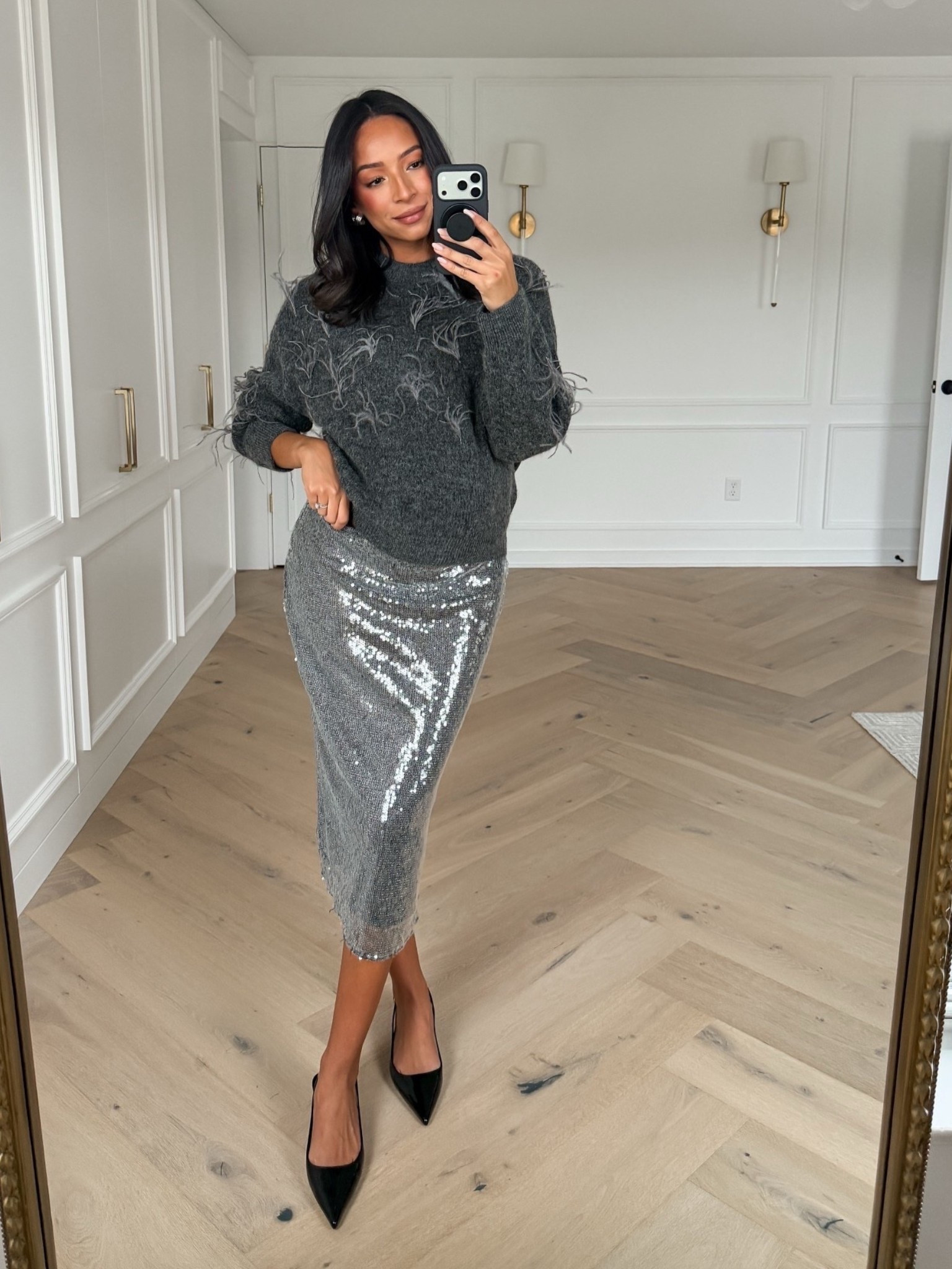 Up to 50% OFF Mango! These feather embellished details are so fun for the holidays and I love that the sequin skirt has an elastic waistband - perfect for the bump! Wearing size M sweater and size M sequin skirt 

New Years Eve outfit 
NYE outfit 
Winter outfit
Winter fashion
Mango sale

#LTKFindsUnder100 #LTKSaleAlert #LTKSeasonal