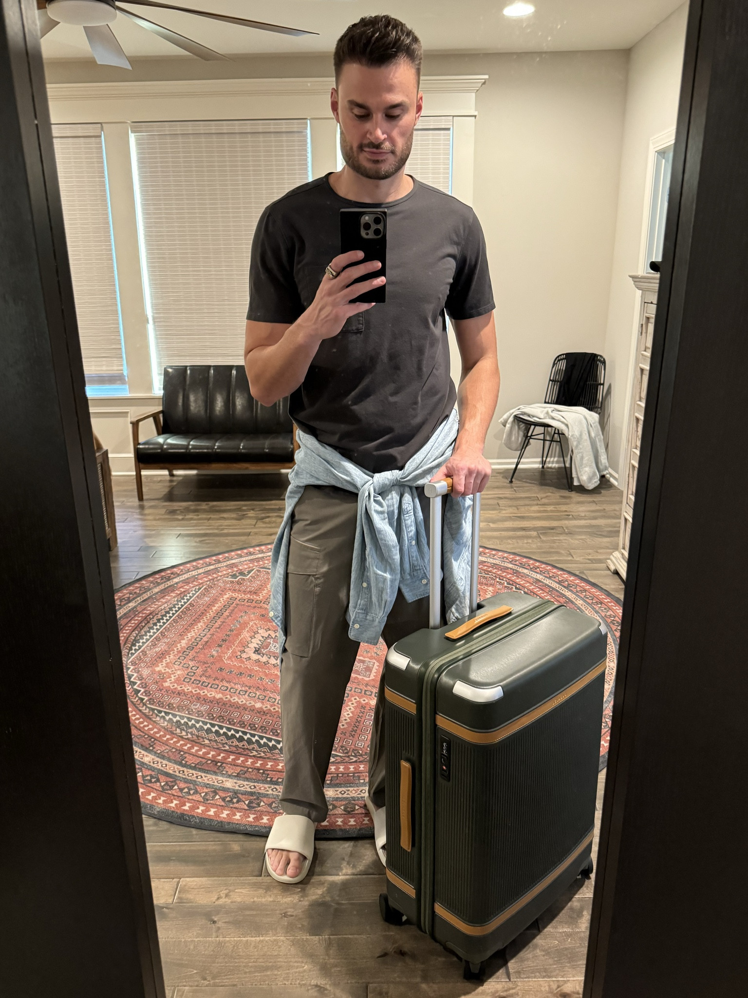 Shop this casual travel fit 🧳✈️.
I’m 6’4’’ - 205 and wear size 32 pants, LT button down, XL tee, size 12 slides. 
Comfortable but a step above wearing a sweatsuit. Using the Faherty button down as my “beach jacket” on the trip. These cargo pants looked good with sneaks too. Wanted to be extra comfy today so I chose the Lulu slides. Went with the larger size paravel aviator suitcase too. Couldn’t decide between 3 dinner outfits so just decided to bring them all - hence the bigger check bag vs the carry on. 

#LTKmens #LTKtravel #LTKstyletip