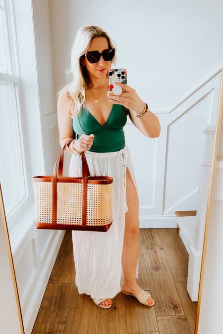 Resort Wear

One Piece swimsuit by Cupshe. Under$40. Great style, I love the back, lots of support through the chest. Higher rise leg, full coverage bottom. 

Target cane beach tote

Celine sunglasses 

Dolce and gabanna slides



#LTKswim #LTKfindsunder50 #LTKover40