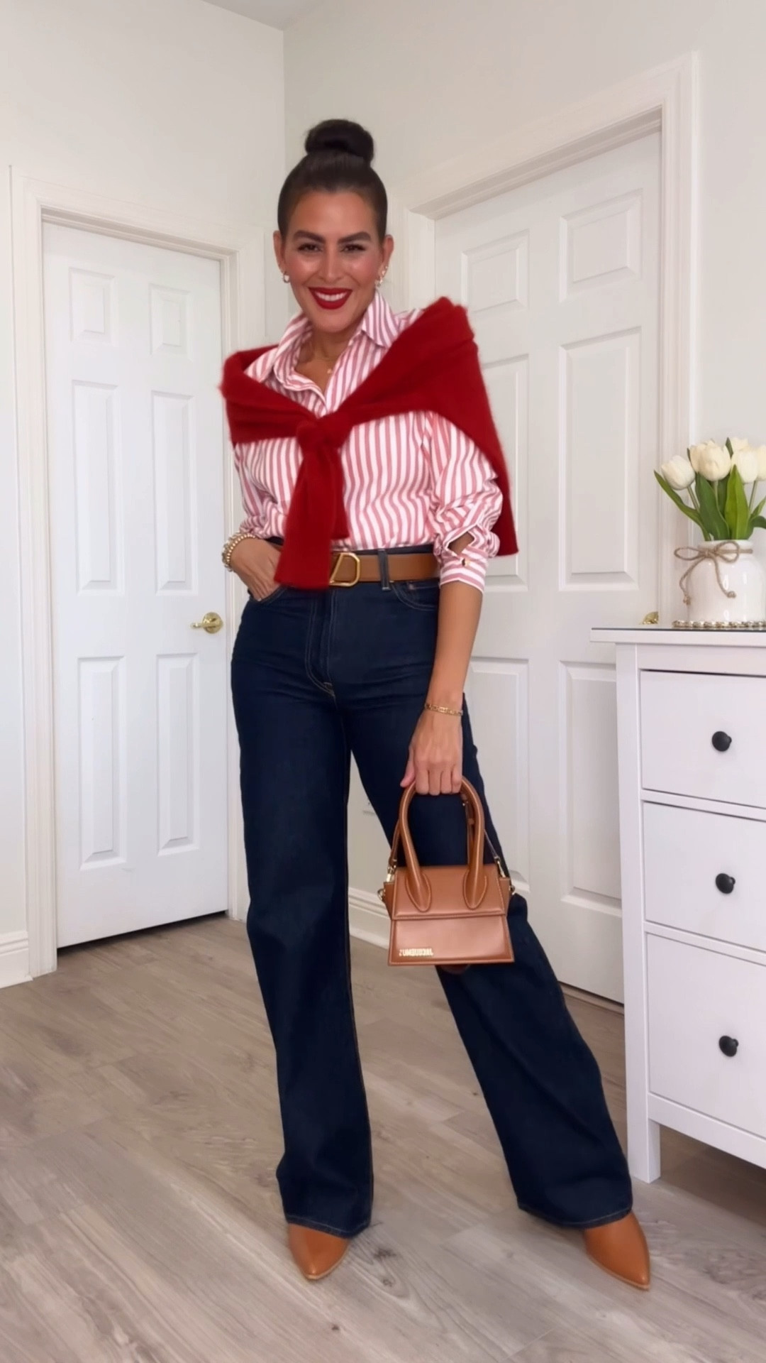 Red lipstick: The mvp
Size S in shirt. Is oversized.
Size 26 in jeans.
Size up in bra. Waist runs small. Wearing 36B, usually 34B. 
Cardigan and silk skirt are on sale. Wearing a size M in cardigan and 6 in skirt. 

#LTKSeasonal #LTKOver40 #LTKFindsUnder100