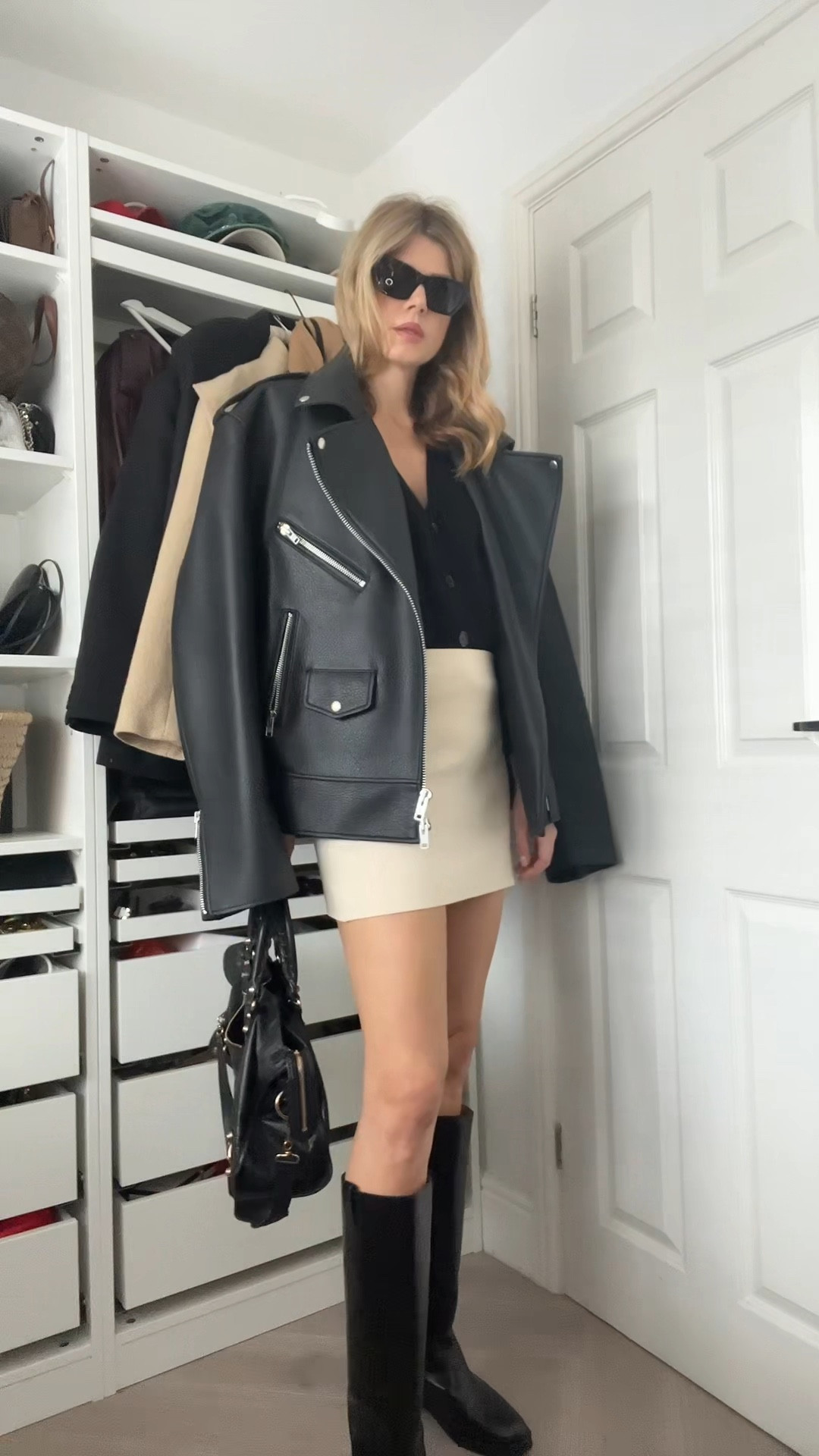 Knit skirt, leather jacket, biker jacket, balenciaga bag, riding boots, sezane boots 

#LTKautumn #LTKeurope #LTKwinter