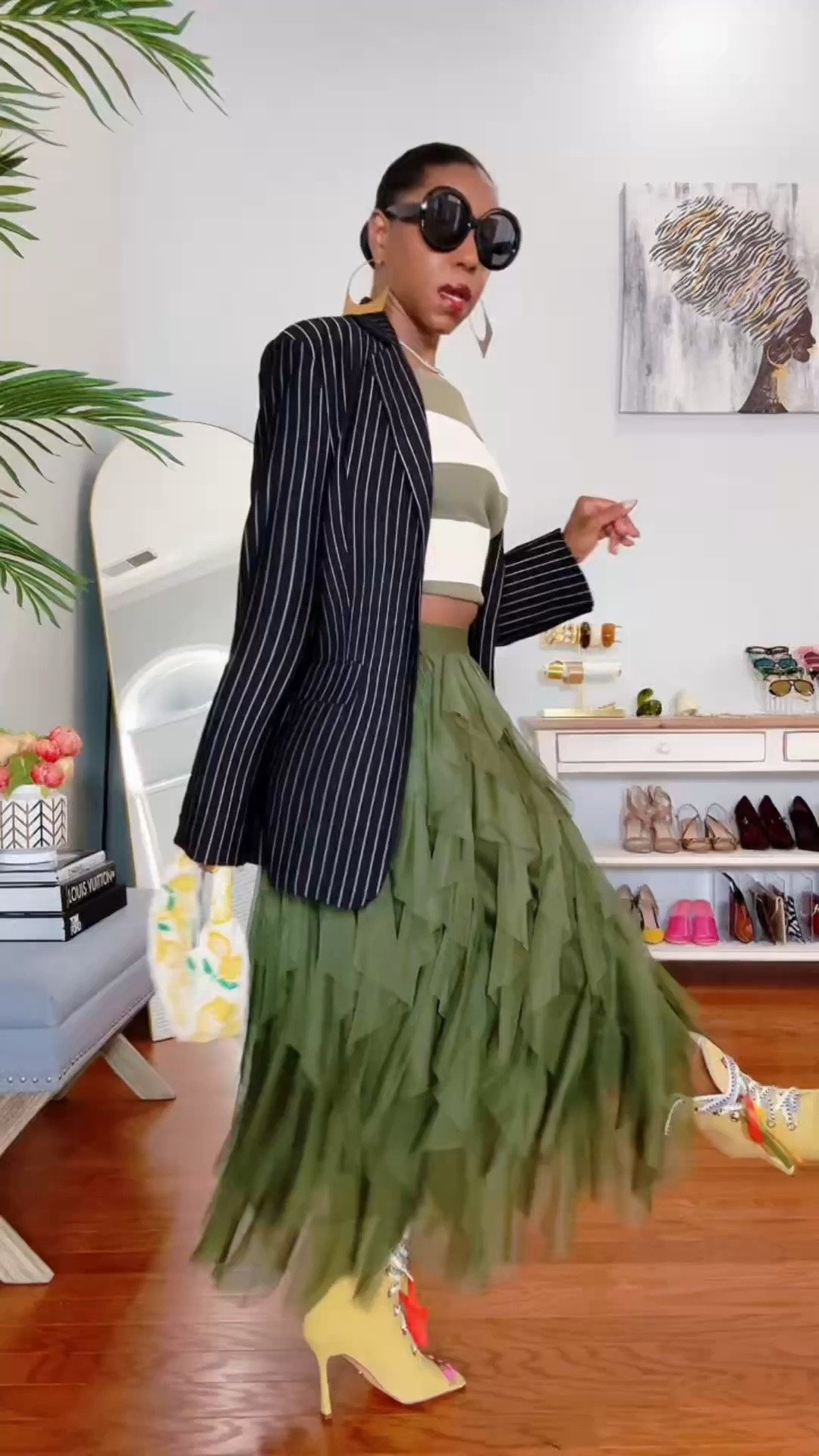 Never afraid to push the style envelope. 💋
This tulle skirt is having its moment and I’m here for it!

Mixing pieces that shouldn’t work together…but absolutely do! ✨

5’4” | 155 lbs | Size M

WHAT I’M WEARING

* Olive + cream off-the-shoulder knit top -M
* Olive tiered tulle midi skirt -M
* Yellow lace-up peep-toe booties
* Beaded lemon handbag
* Oversized sunnies

STYLE NOTE: I cropped the top to play with the proportions and give the look a more fashion-forward edge. ✨

Tap to SHOP the look. 

Style it. Own it. SLAY it. 💋

#Over50Style #ThriftedStyle #TulleSkirt #PatternMixing #LTKOver50

#LTKootd #LTKOver40 #LTKMidsize