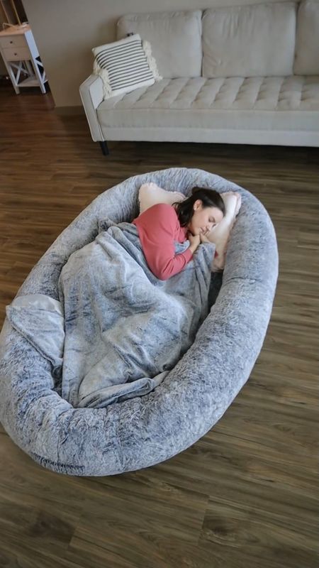 This human-sized dog bed may be the most comfortable bed out there! It comes in three different colors and is machine washable! 

#LTKunder50 #LTKfamily #LTKhome